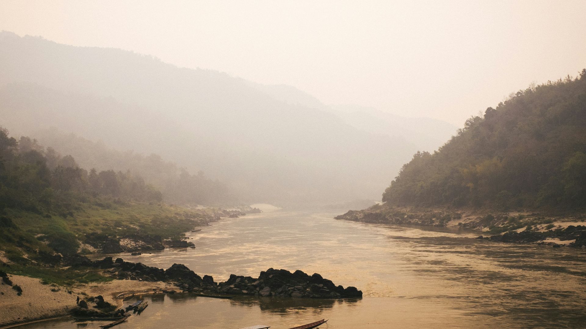 white and black boat on sea during daytime