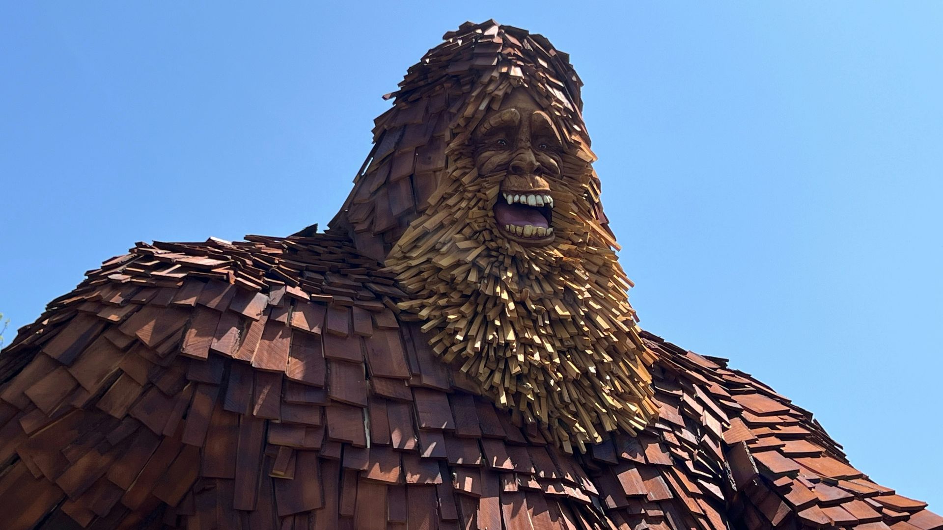 a large statue of a man with a beard