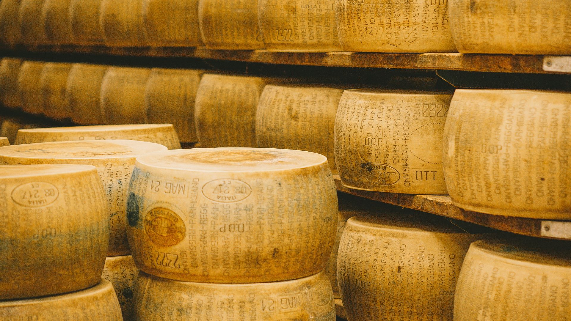a group of white containers with brown powder on them