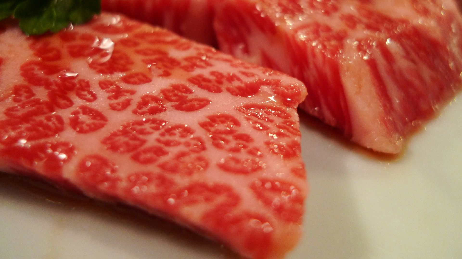 a close up of a plate of food with meat