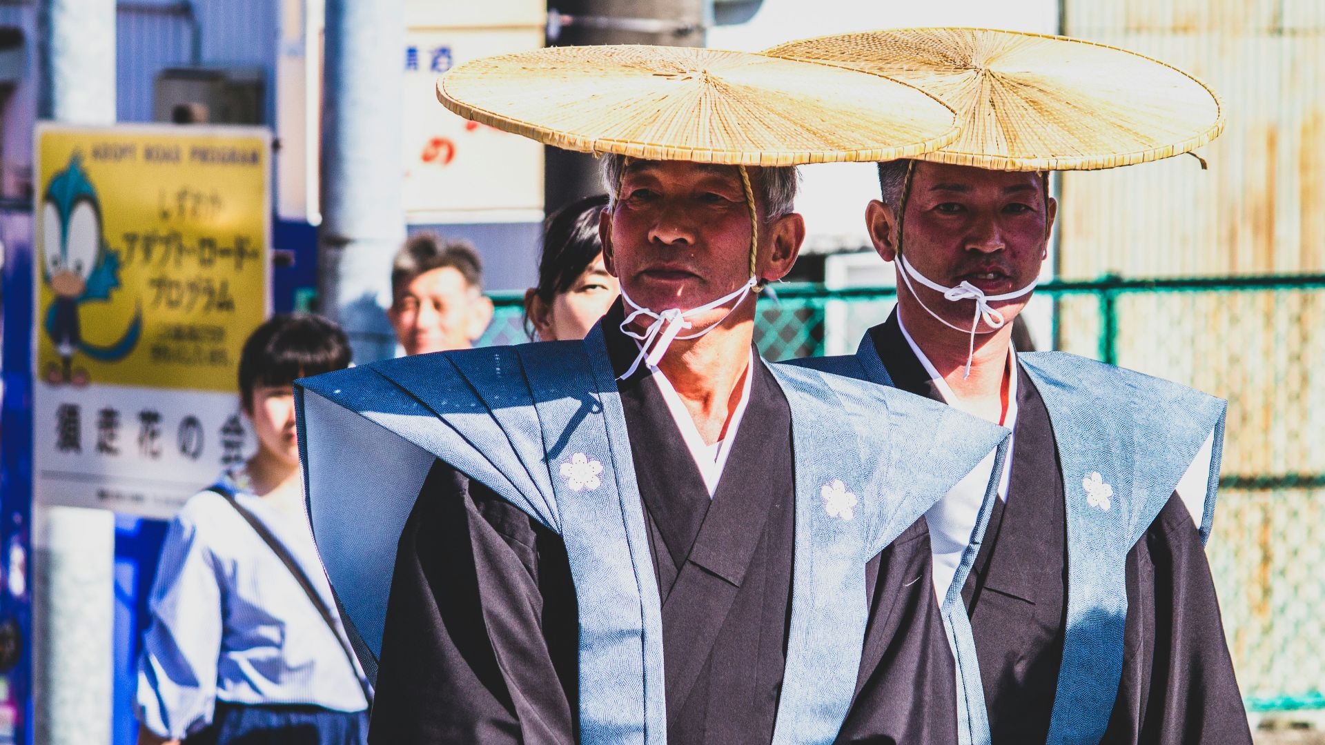 man in black and white coat wearing white hat