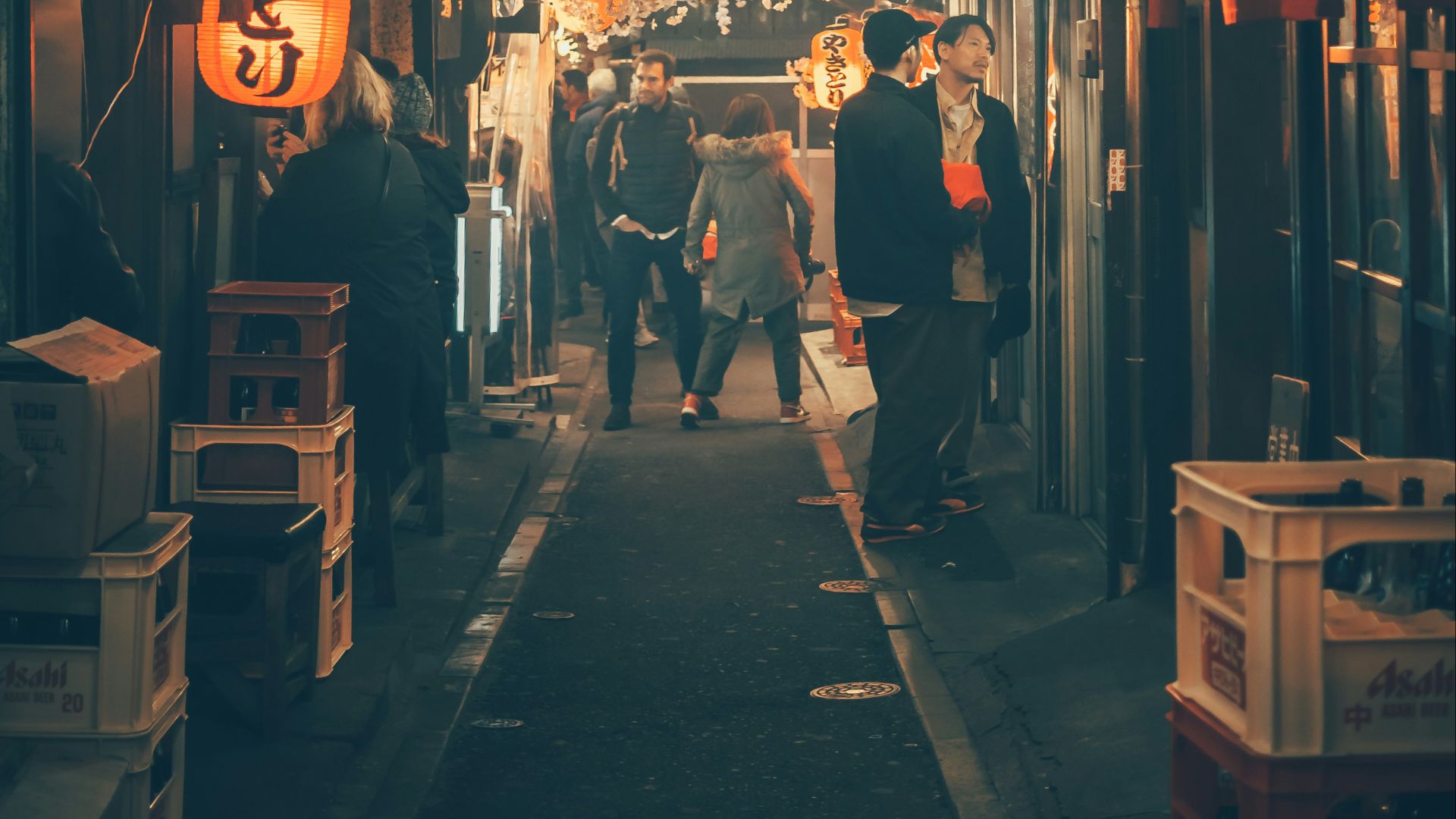 men in black suits standing in the hallway