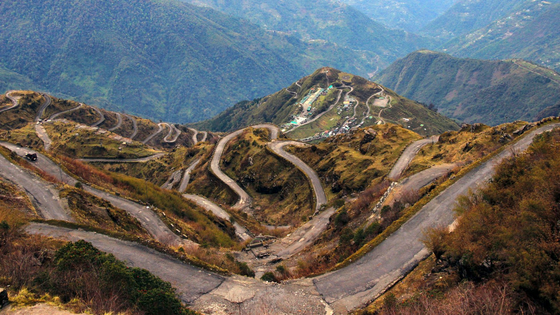 bird'-eye view photography of roads on hil