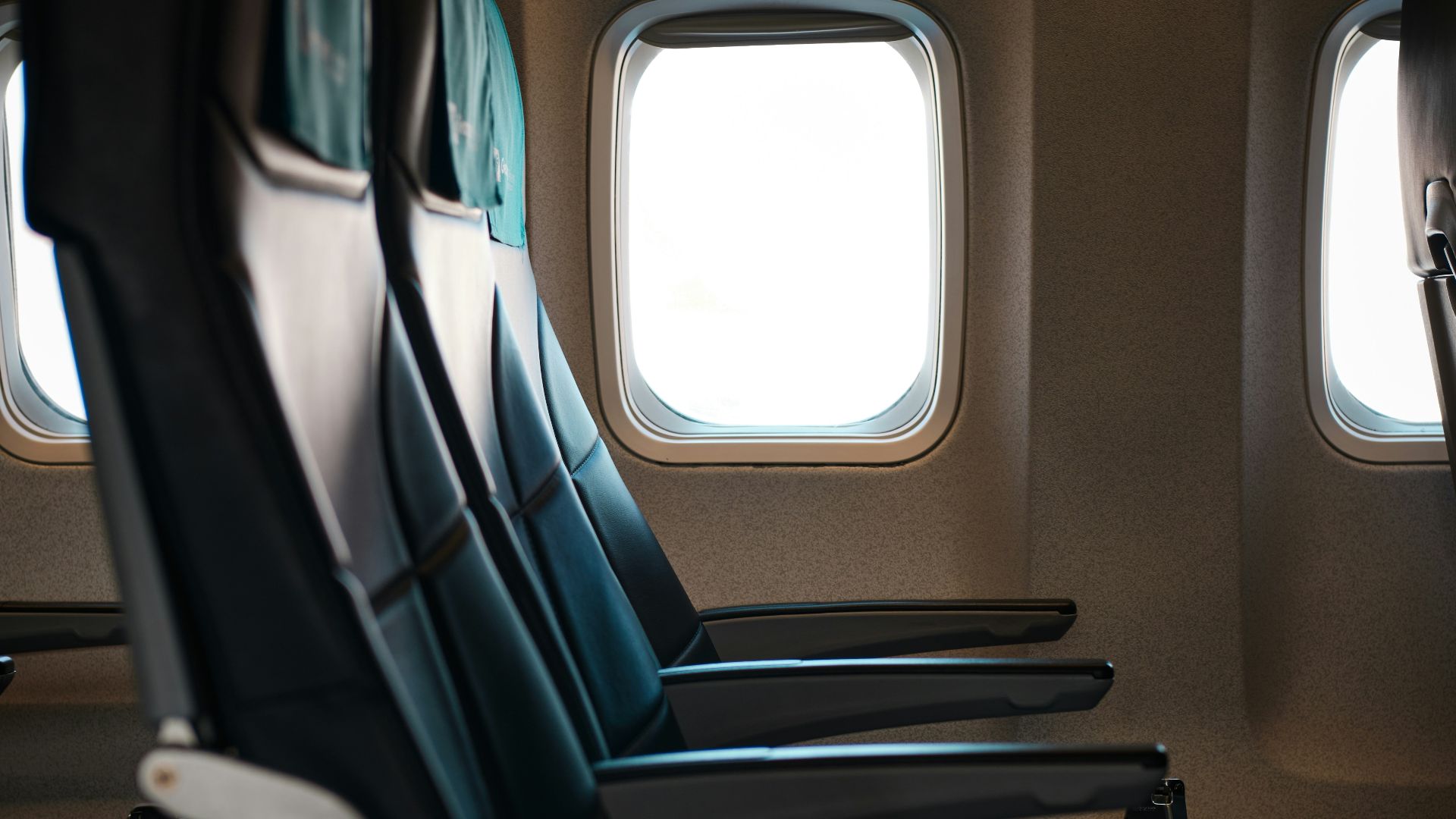 a row of empty seats in an airplane