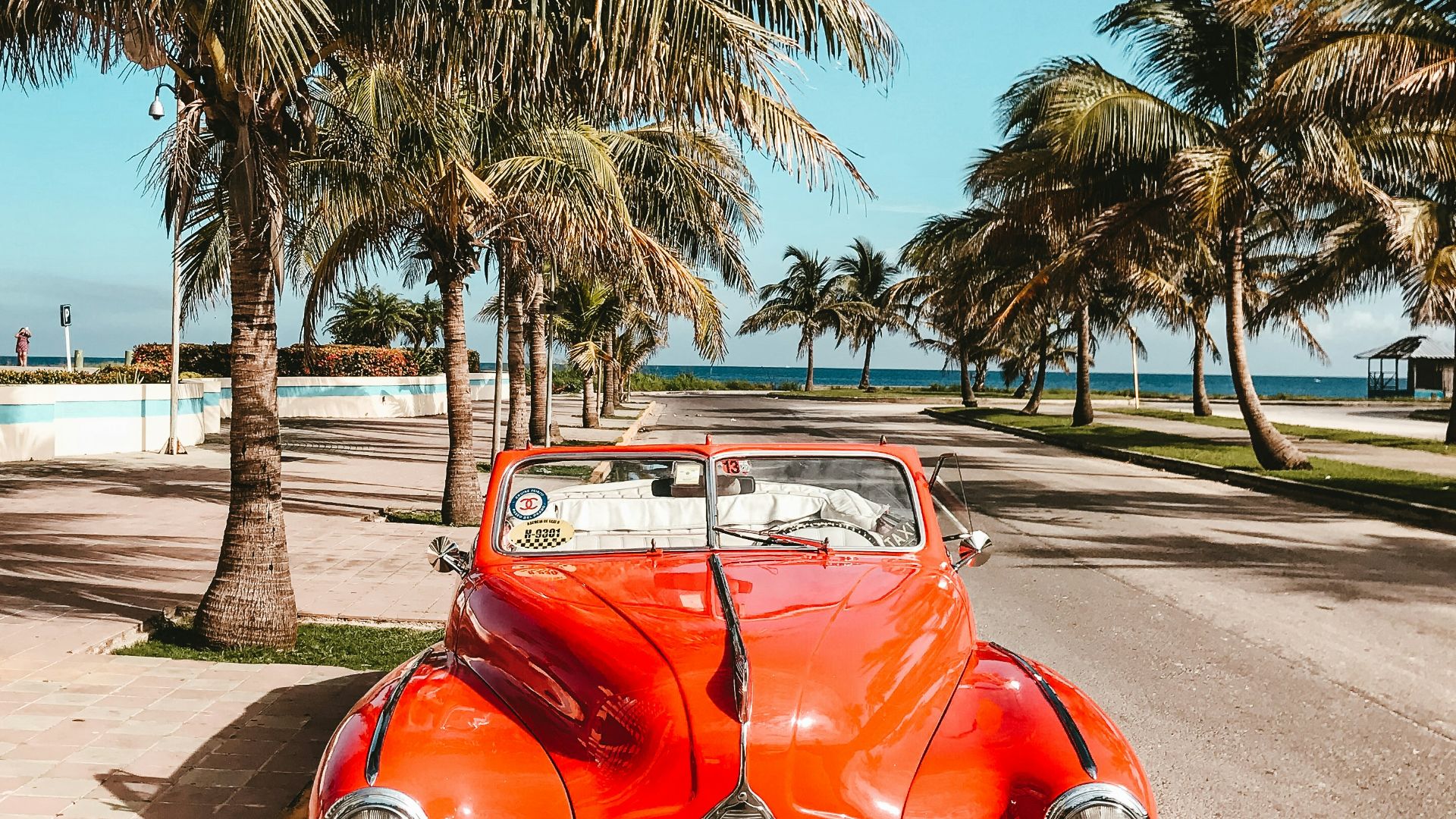orange car on asphalt road