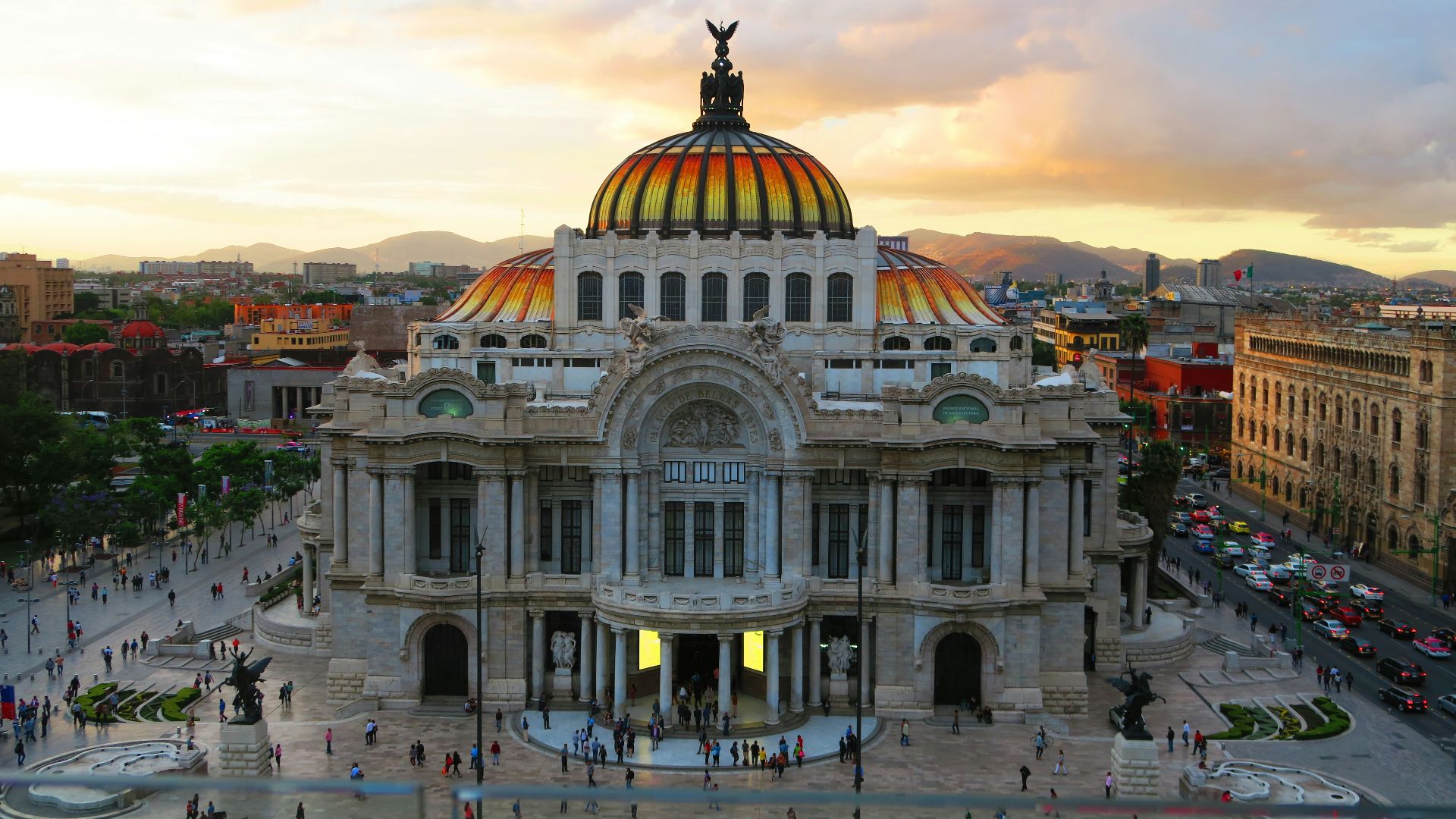 people gathered around gray concrete building