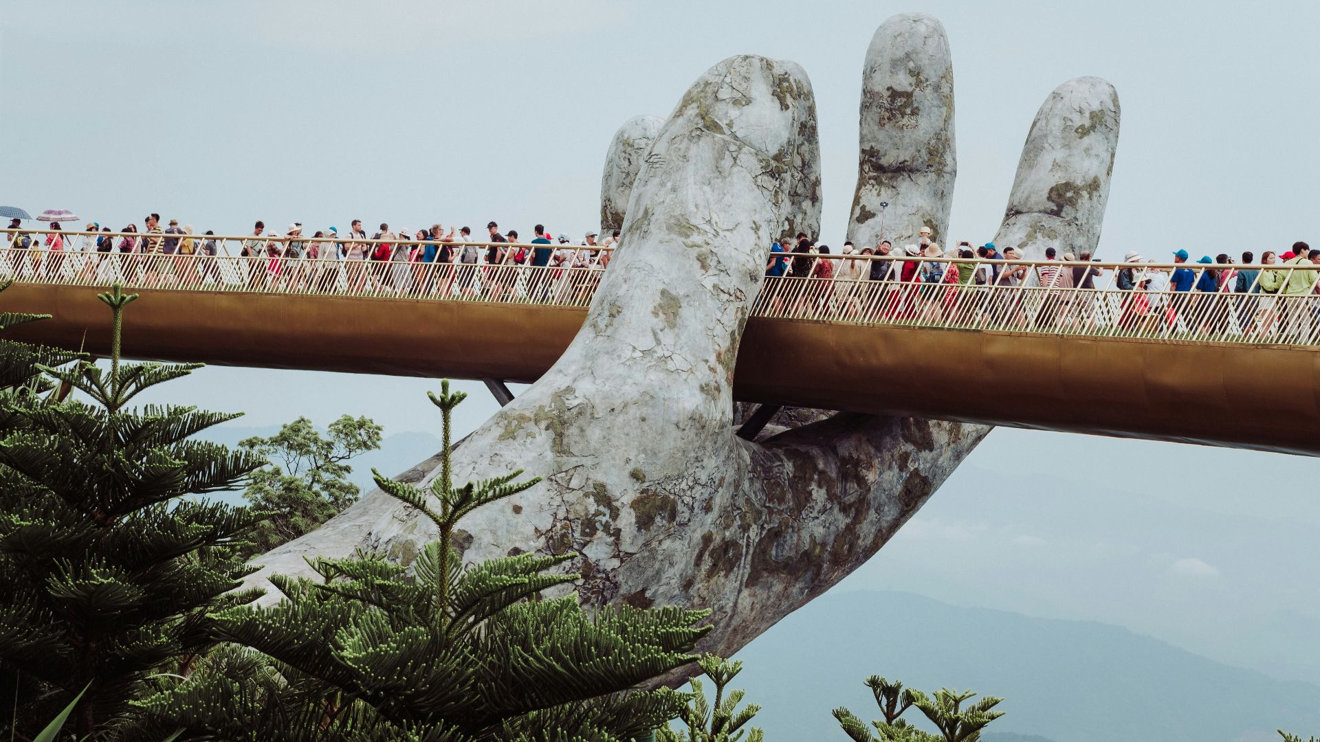 people walking on bridge during daytime