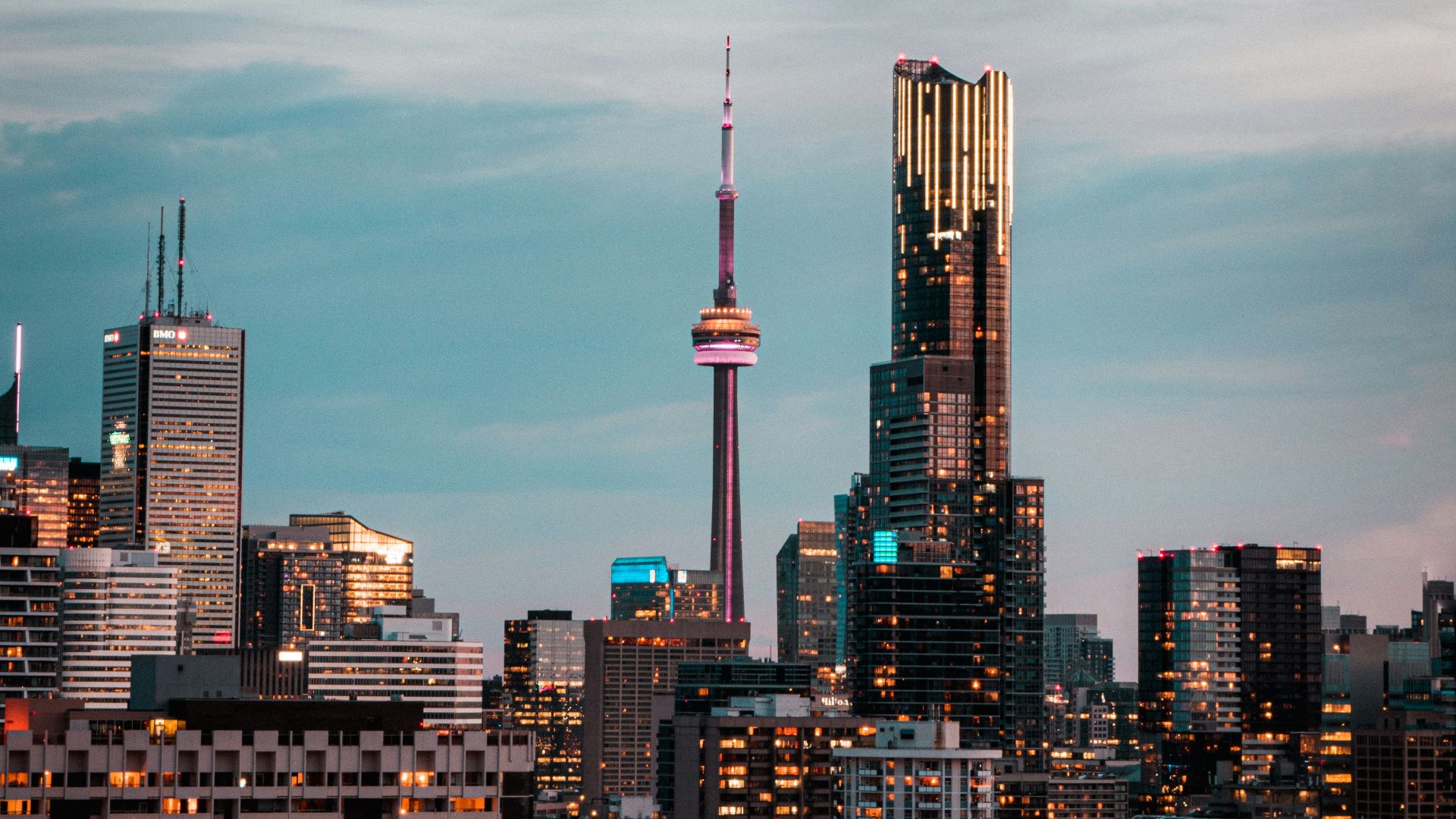 city skyline under gray cloudy sky during daytime