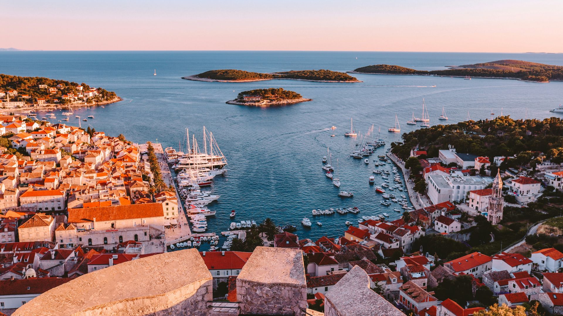 aerial view of city near body of water during daytime