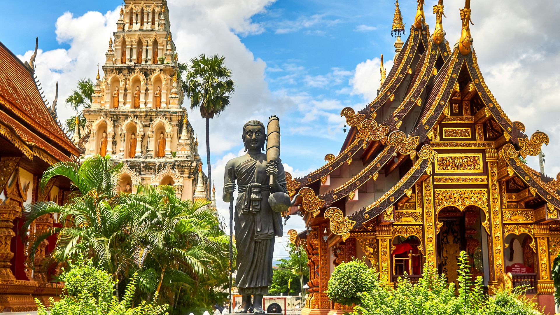 standing statue and temples landmark during daytime