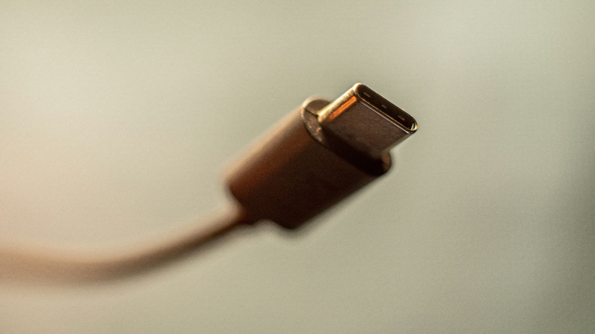 white usb cable on white surface