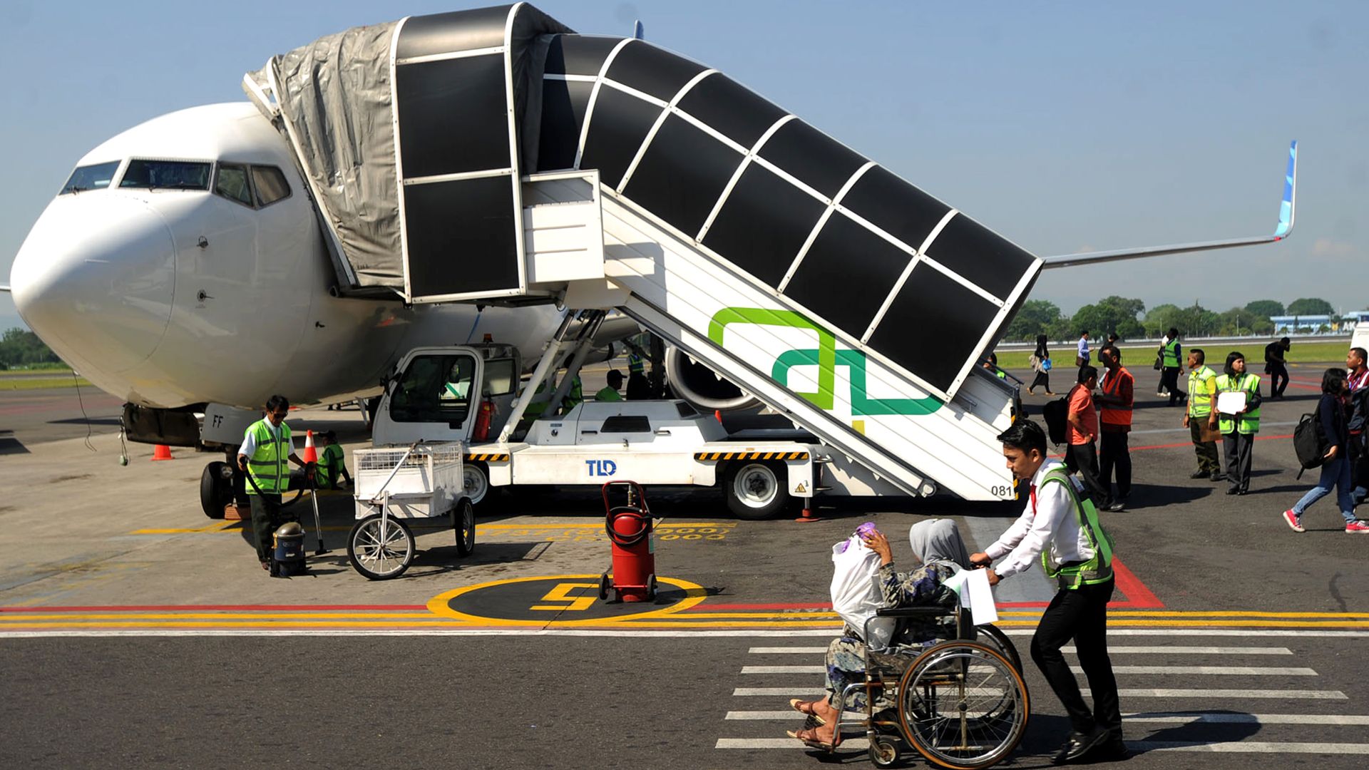 File:Help airplane passengers.jpg