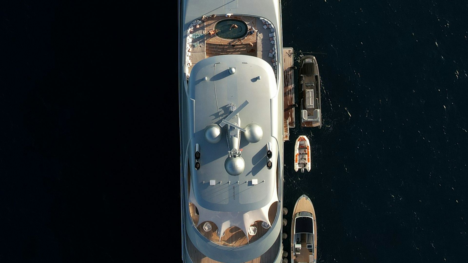 an aerial view of a boat in the water