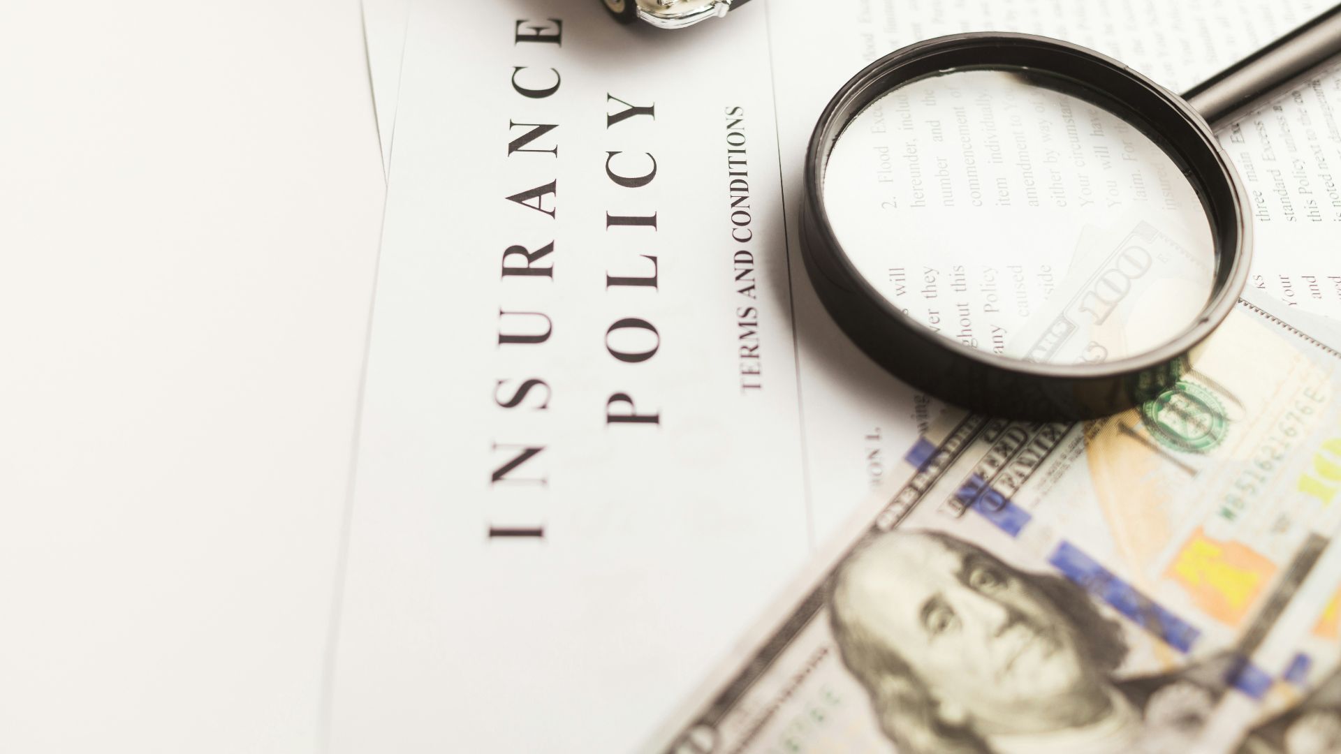 a magnifying glass sitting on top of a piece of paper