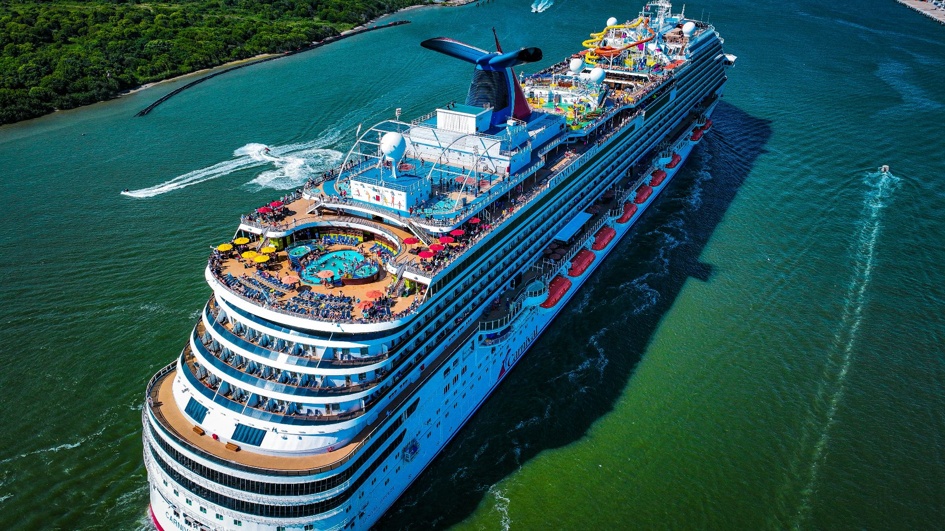 a large cruise ship in the middle of a body of water