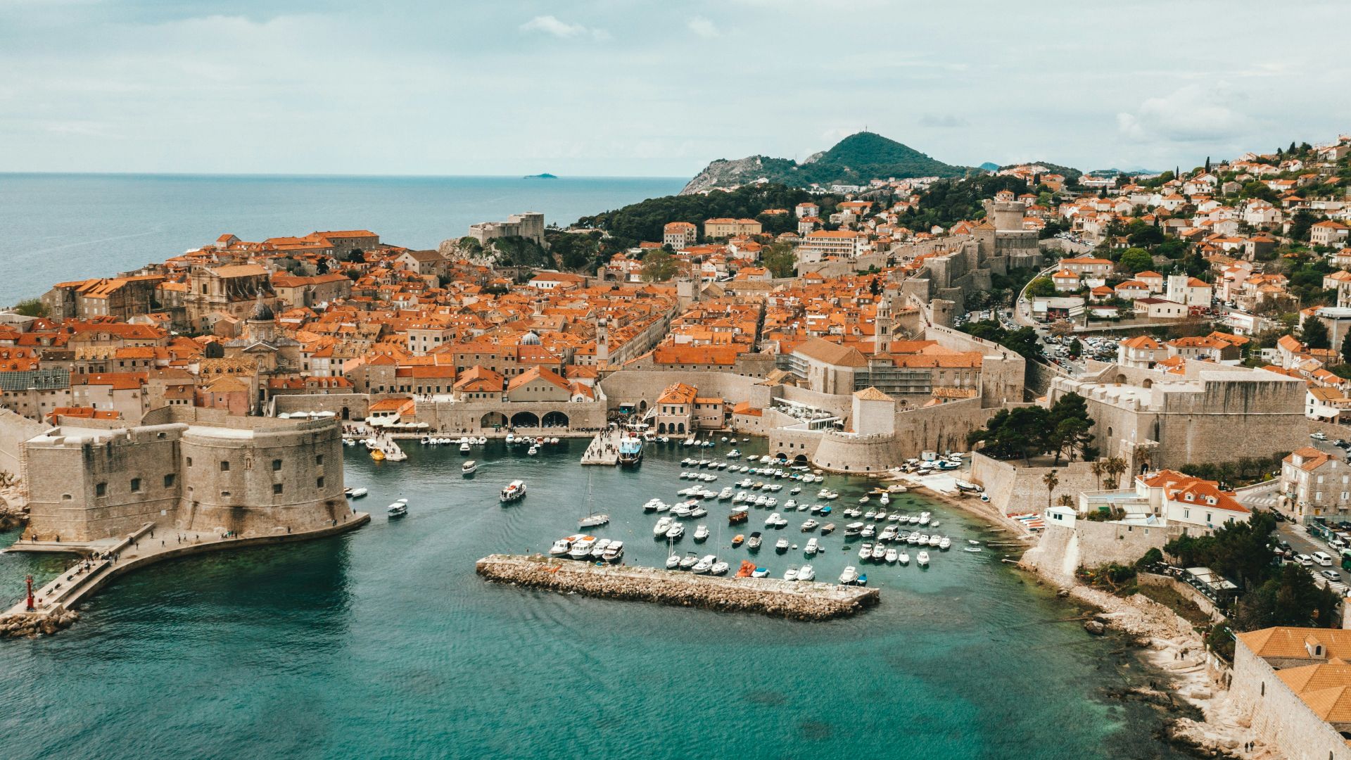aerial view of buildings near ocean