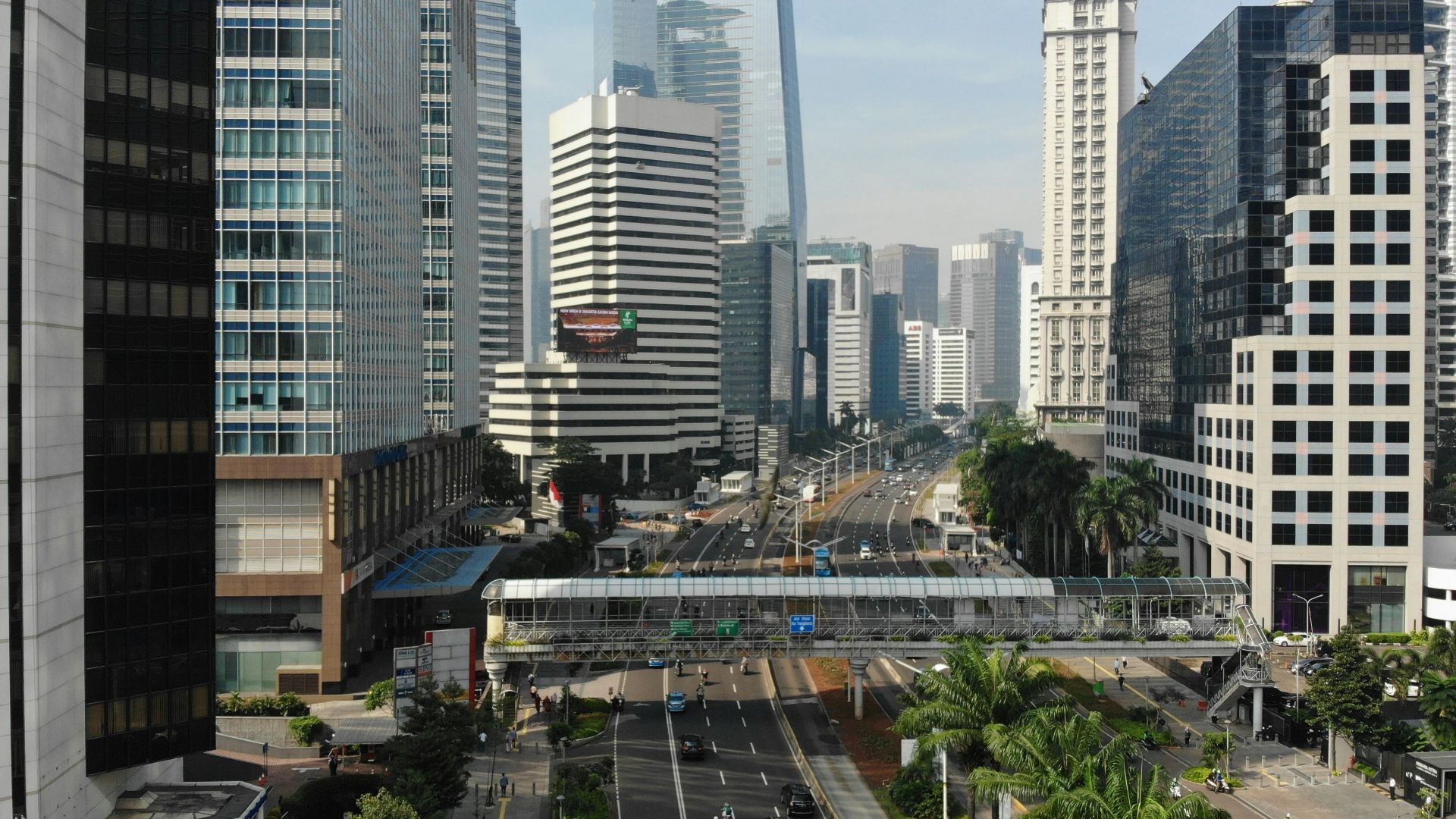 vehicle beside concrete building during daytime