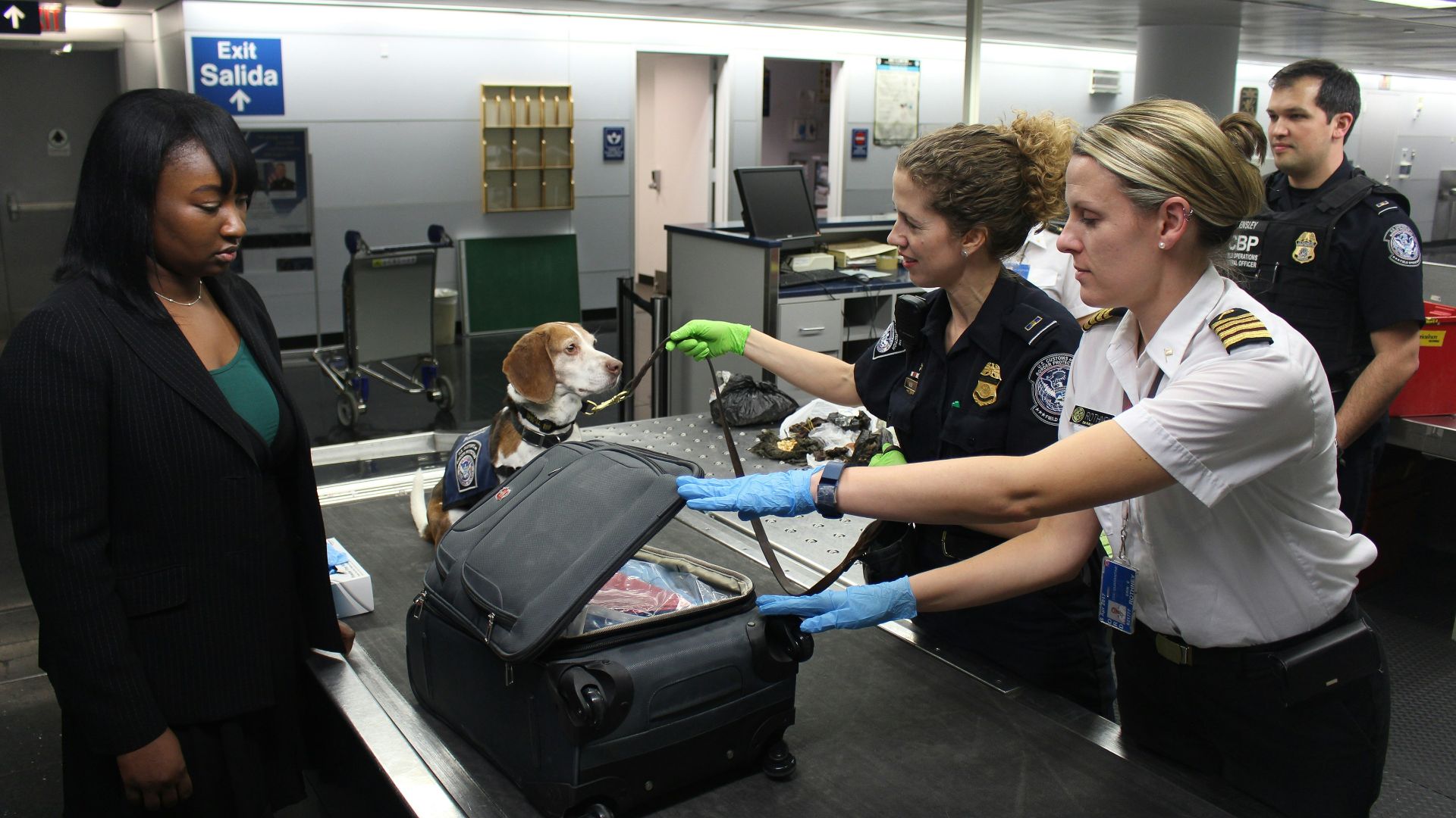 woman in black crew neck t-shirt standing beside woman in white t-shirt