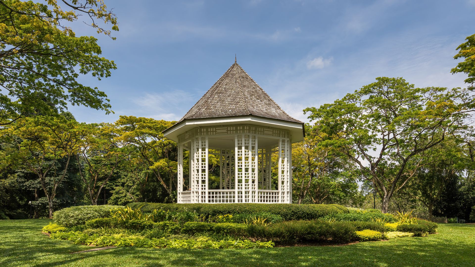 File:Bandstand and green trees a sunny afternoon with blue sky at Singapore Botanic Gardens.jpg