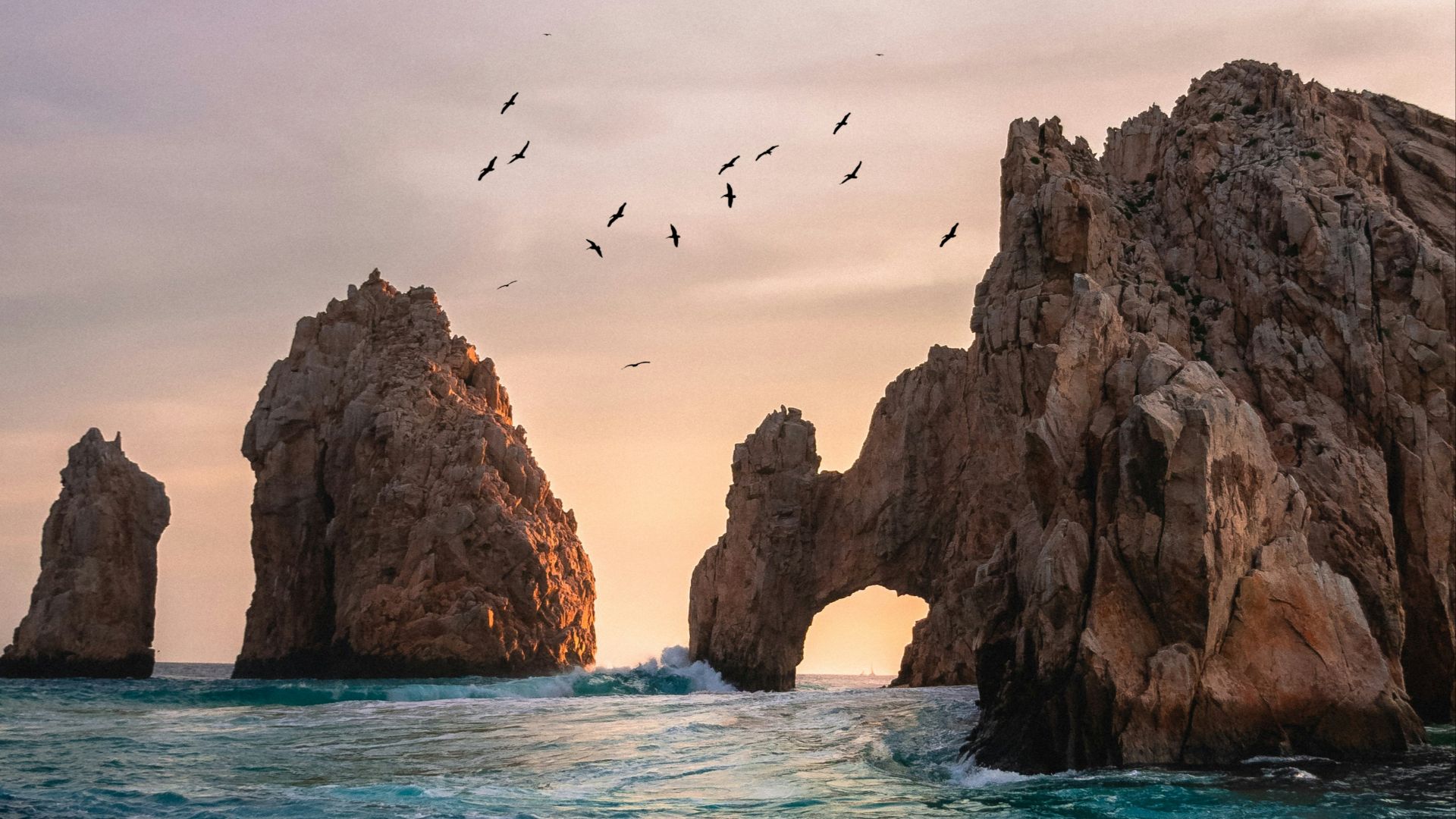 rock formation on the ocean photography