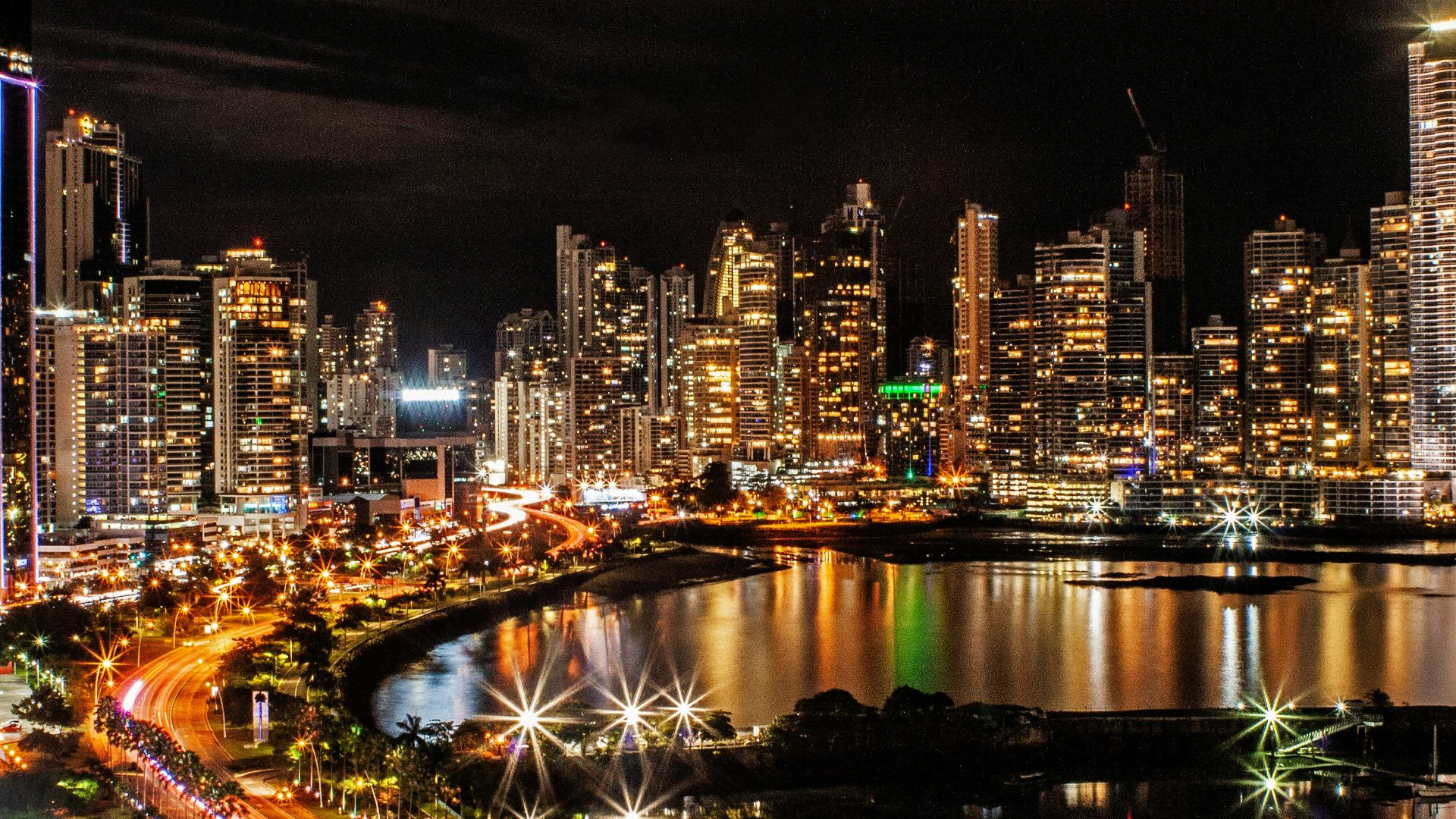 city lights and buildings during nighttime