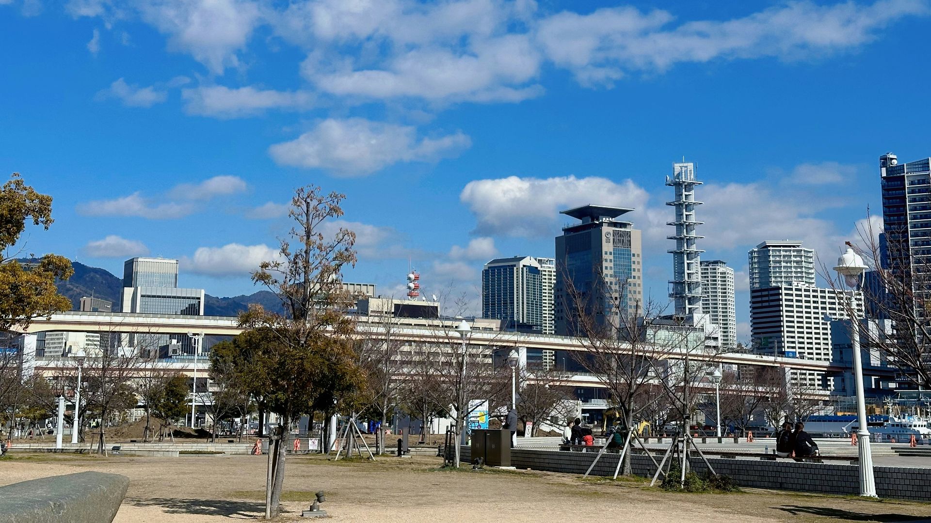 A bench sitting in the middle of a park