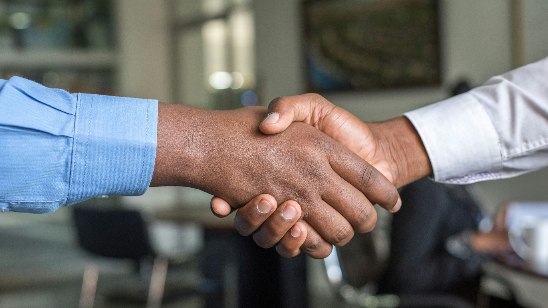 two people shaking hands