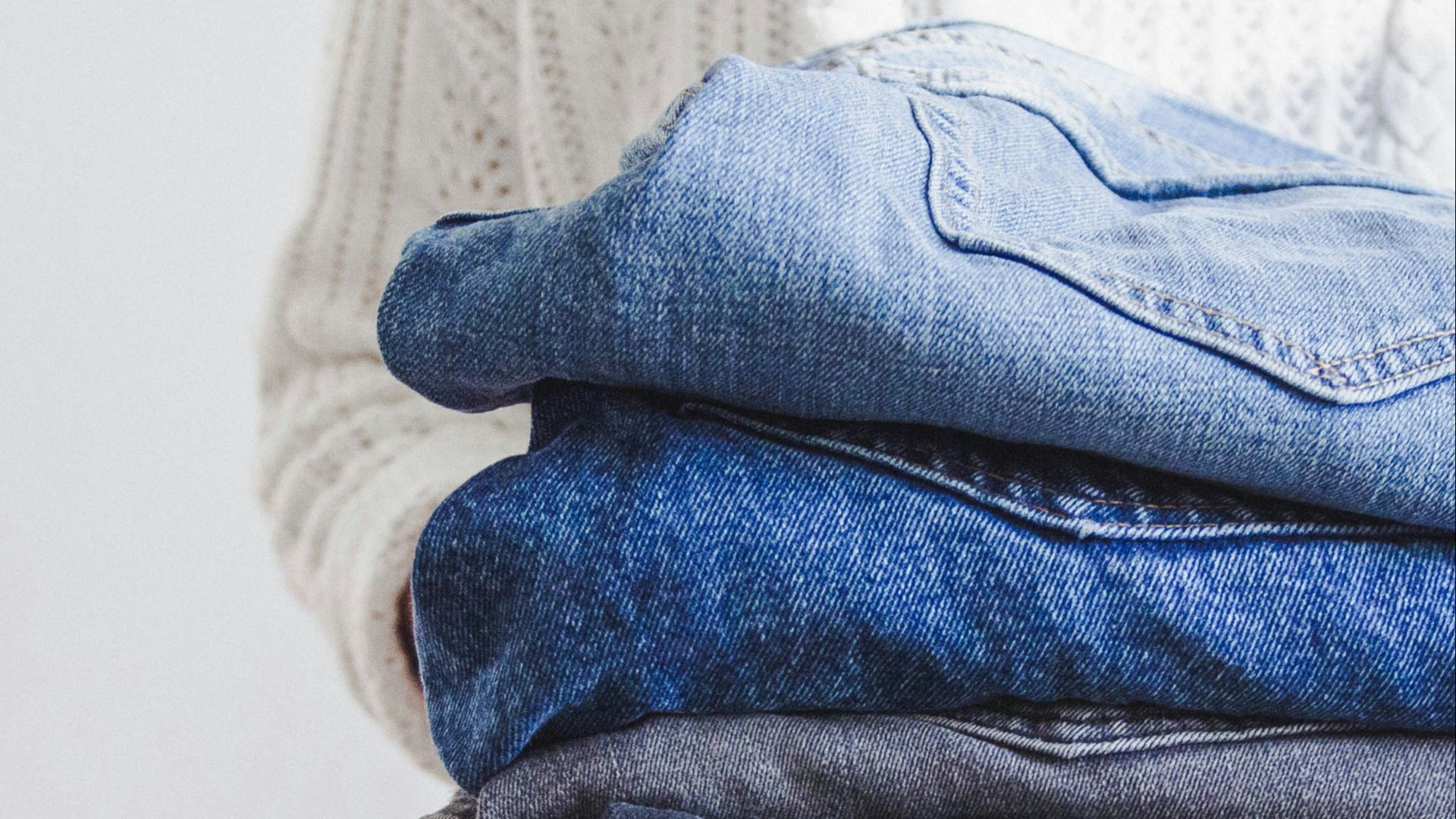 blue and white textile on white textile