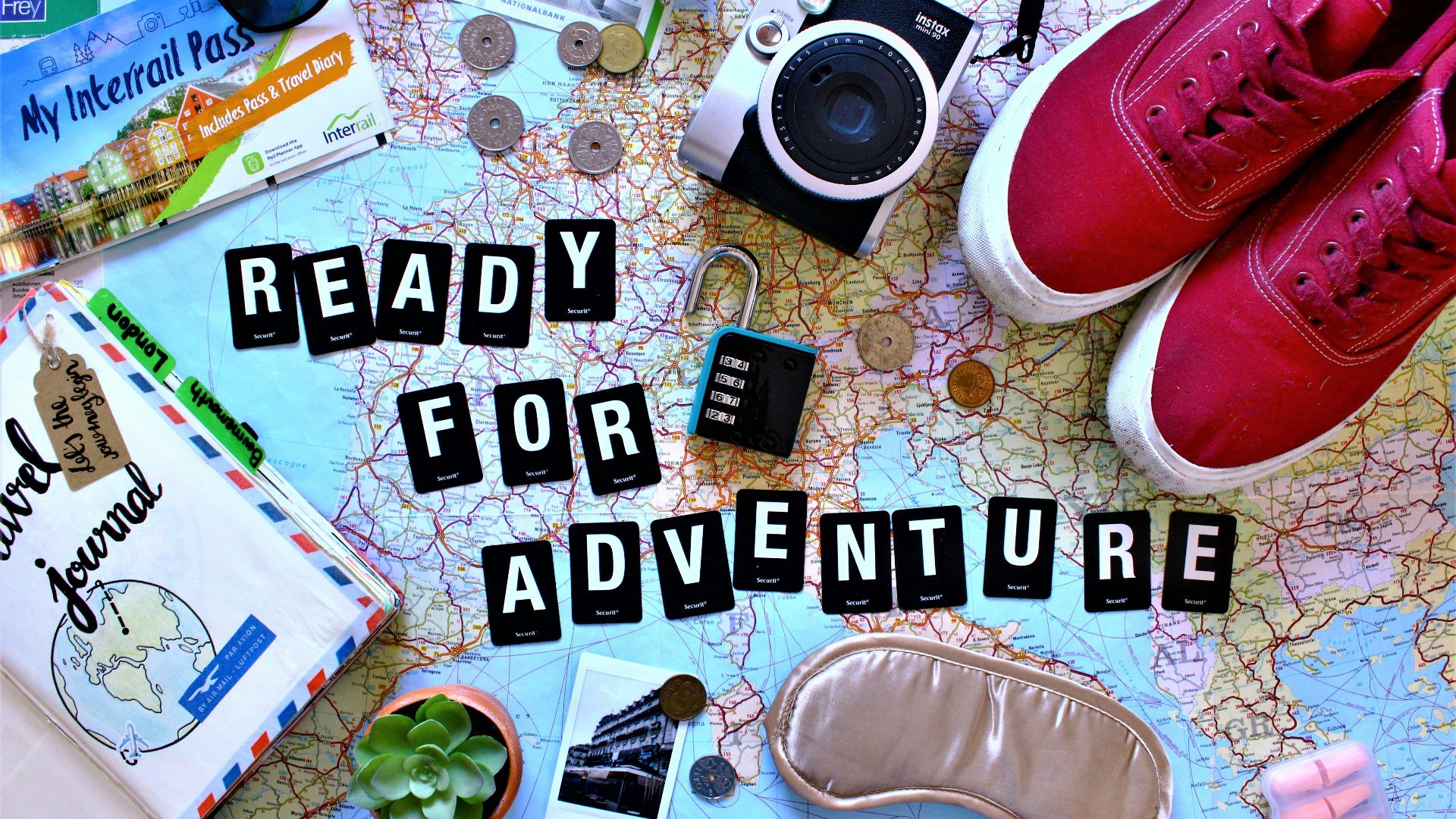 black and silver dslr camera on table