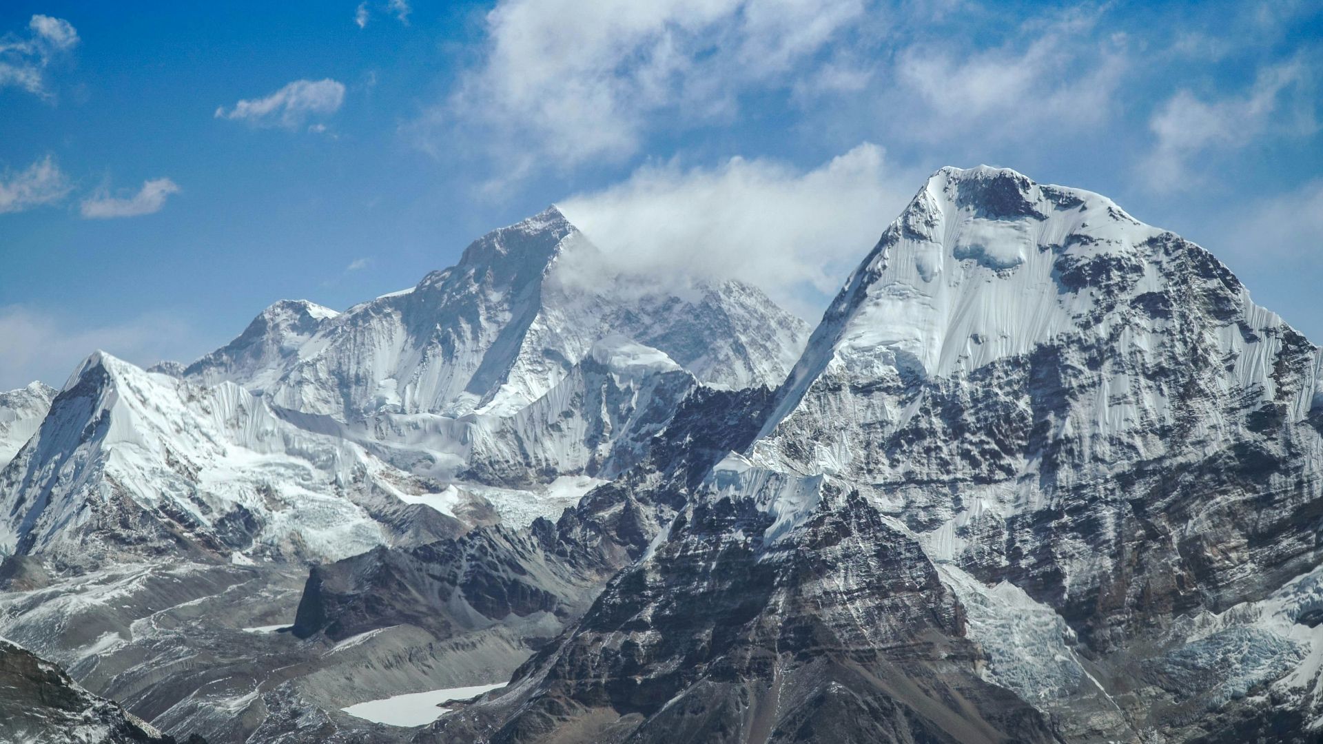 snow covered mountain under blue sky during daytime