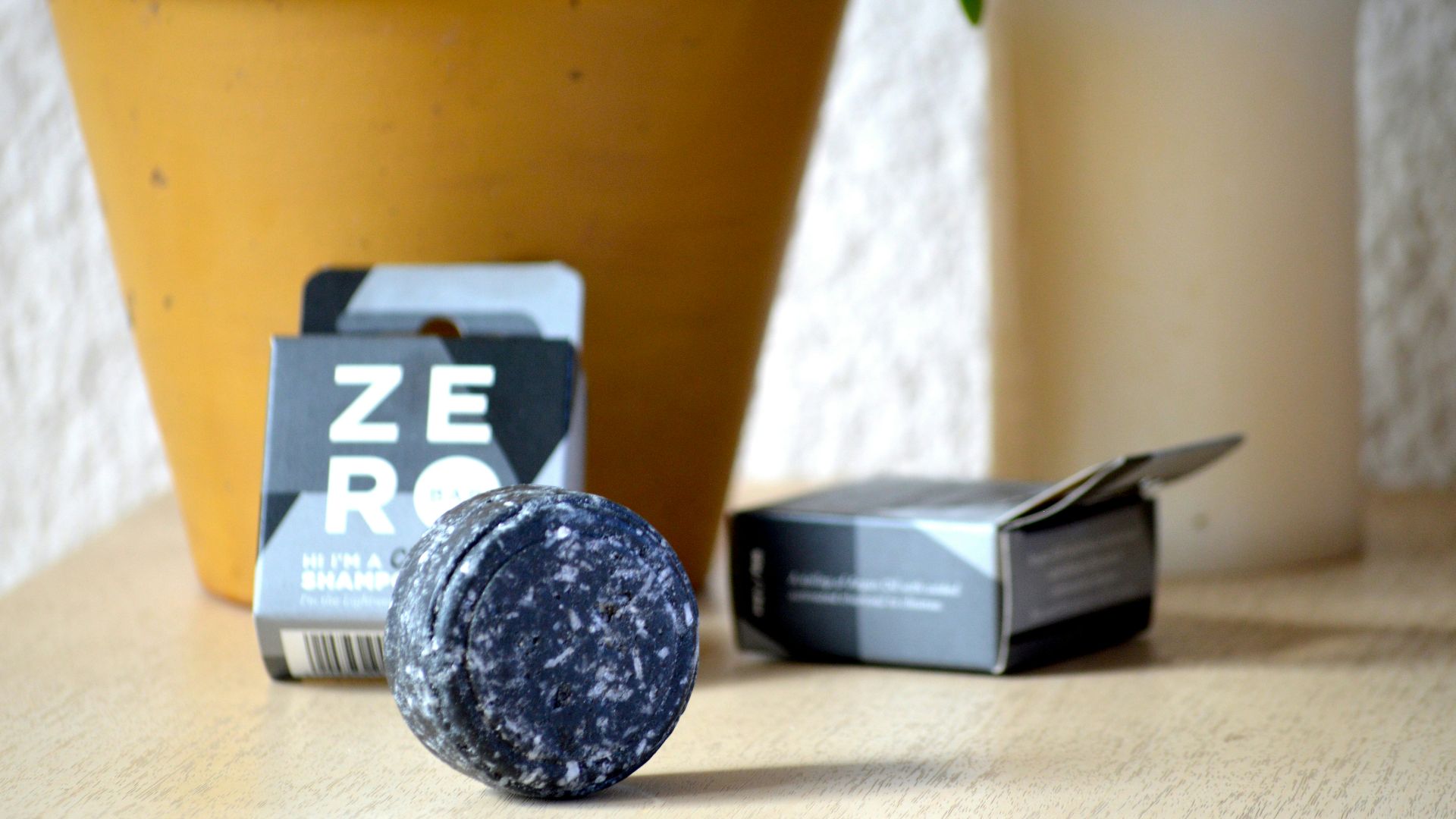 black and white box beside black and silver box