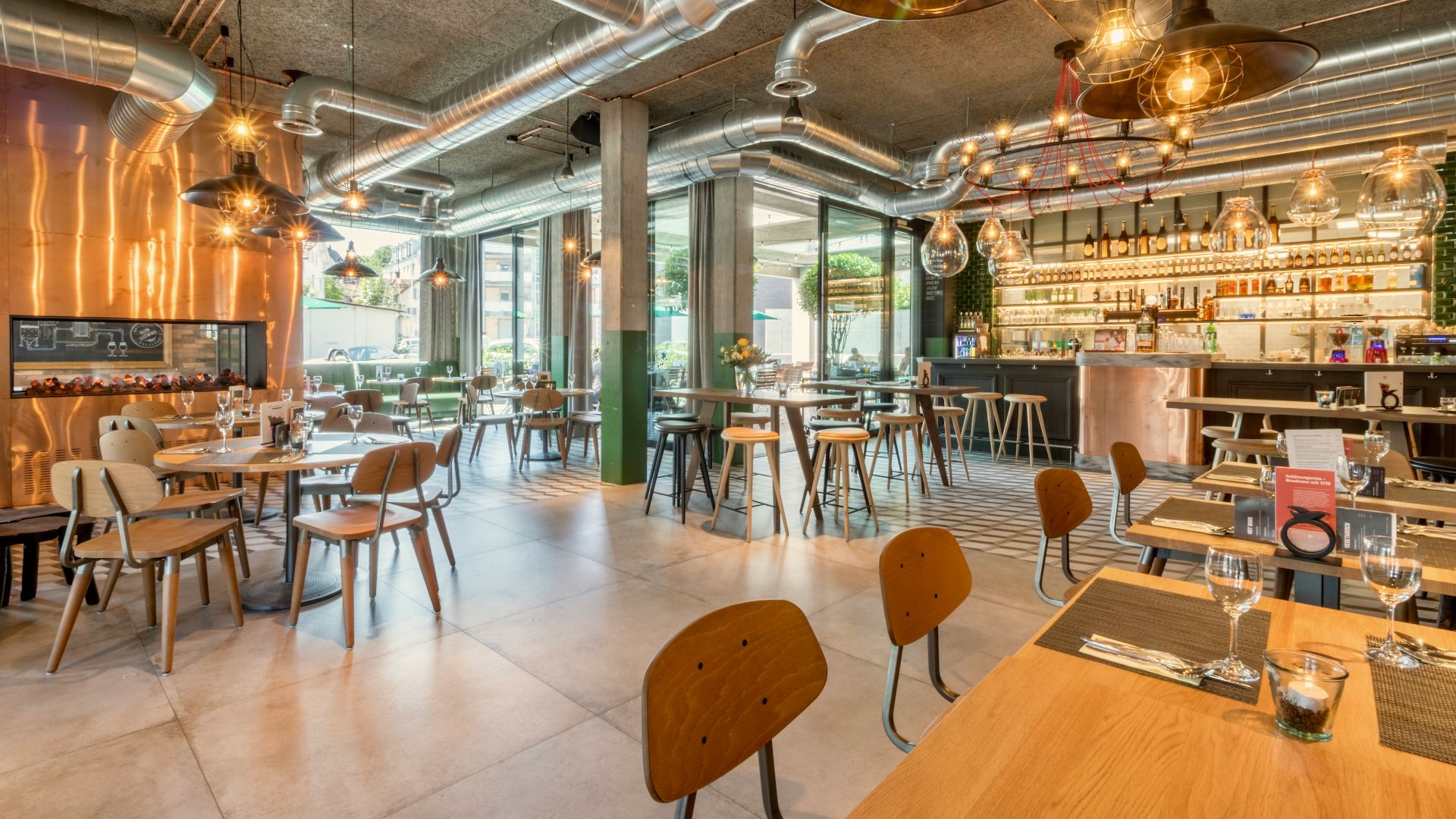 brown wooden tables and chairs inside building
