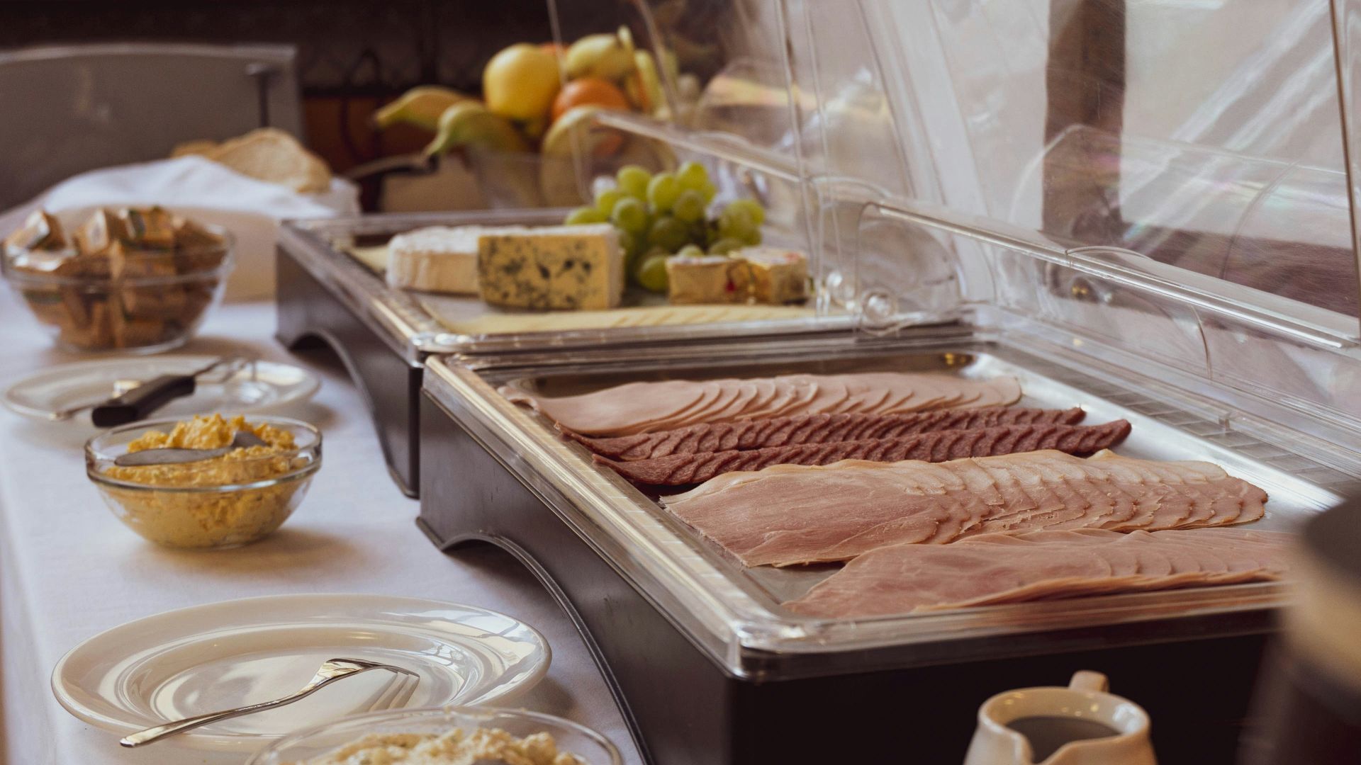 white ceramic plate and black food counter