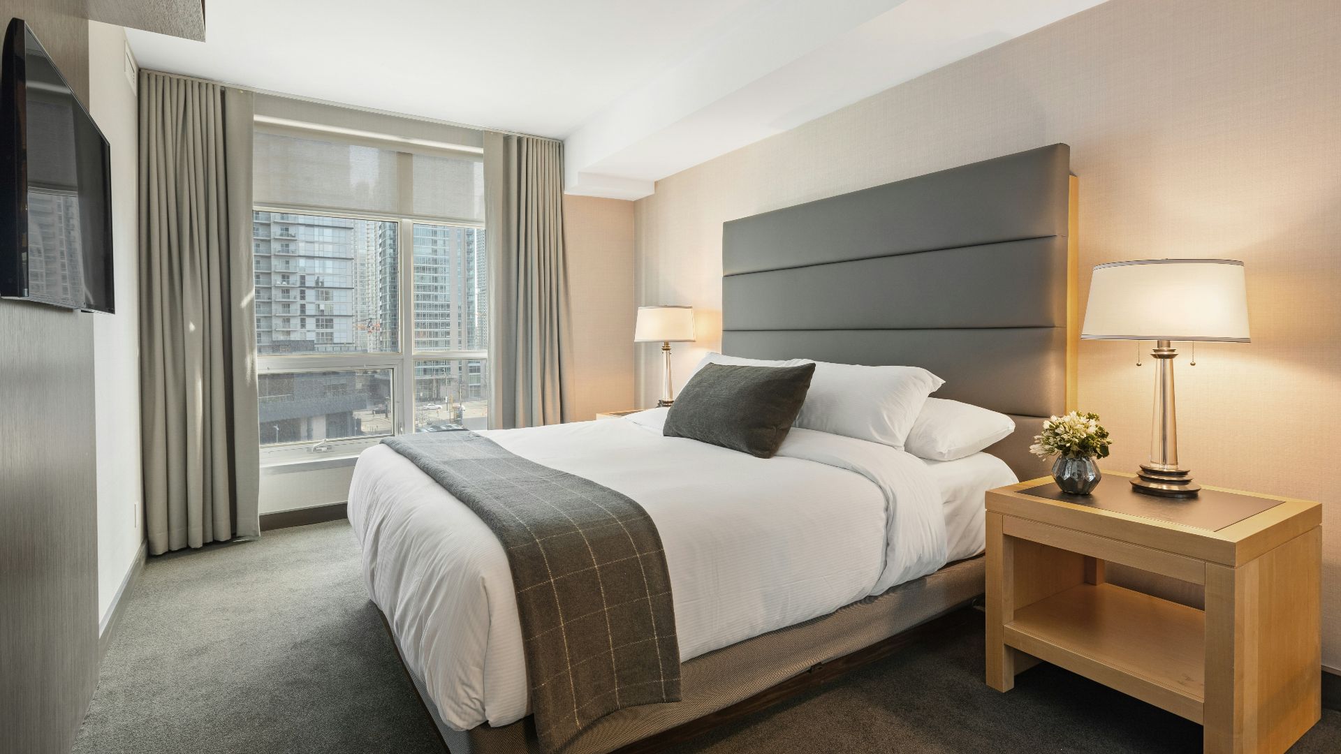 white bed linen on bed