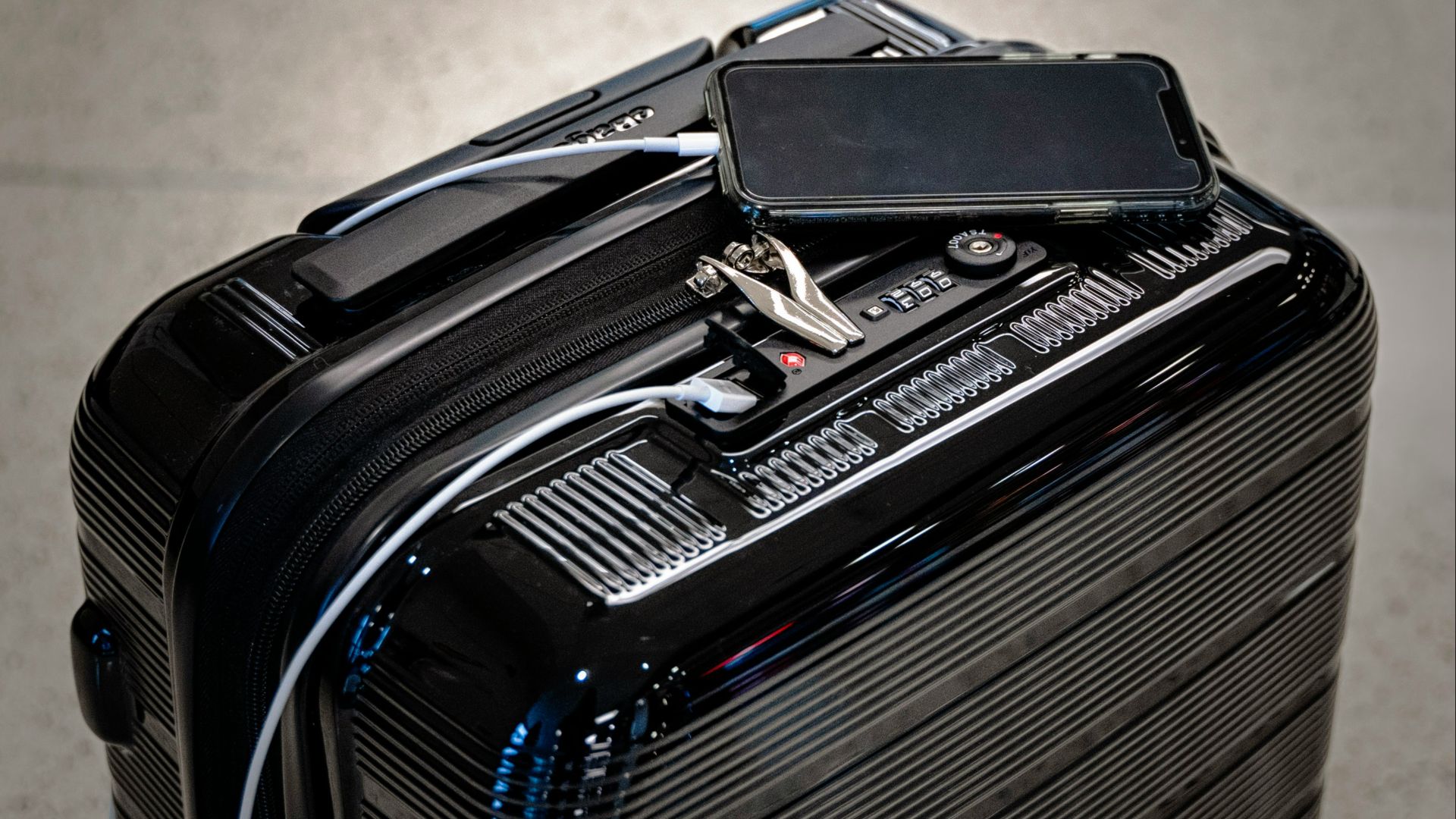 black and gray luggage bag