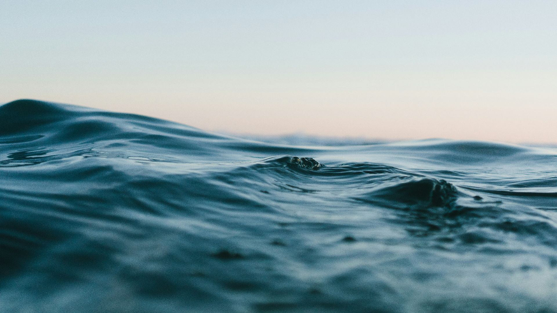 body of water under sky