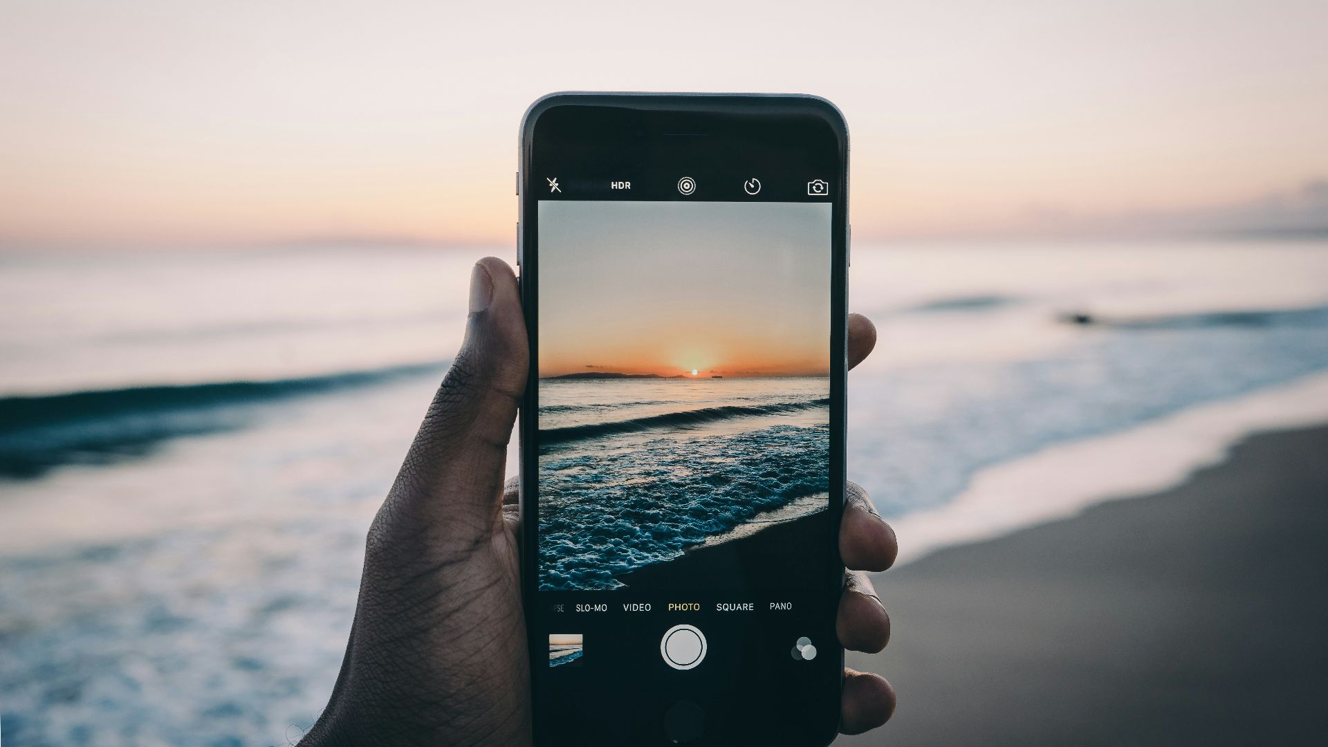 person talking selfie of sea shorre