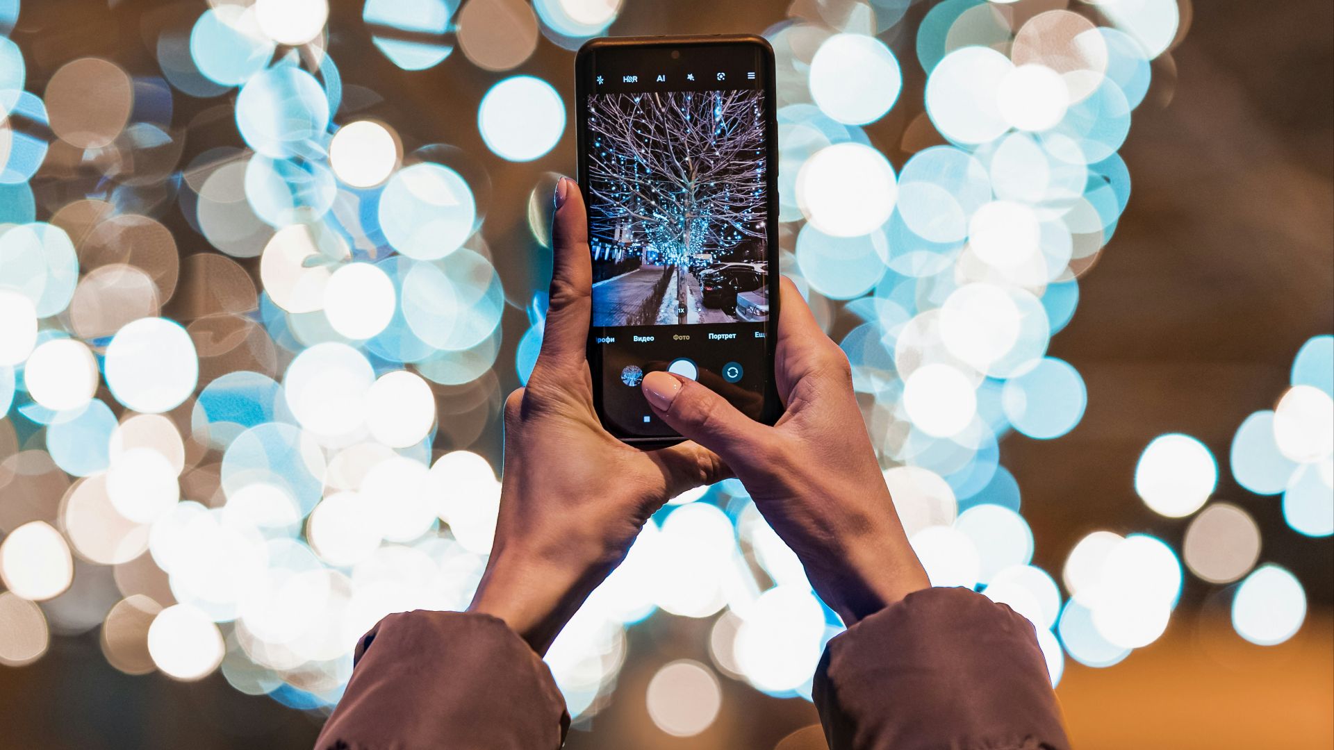 person holding black android smartphone