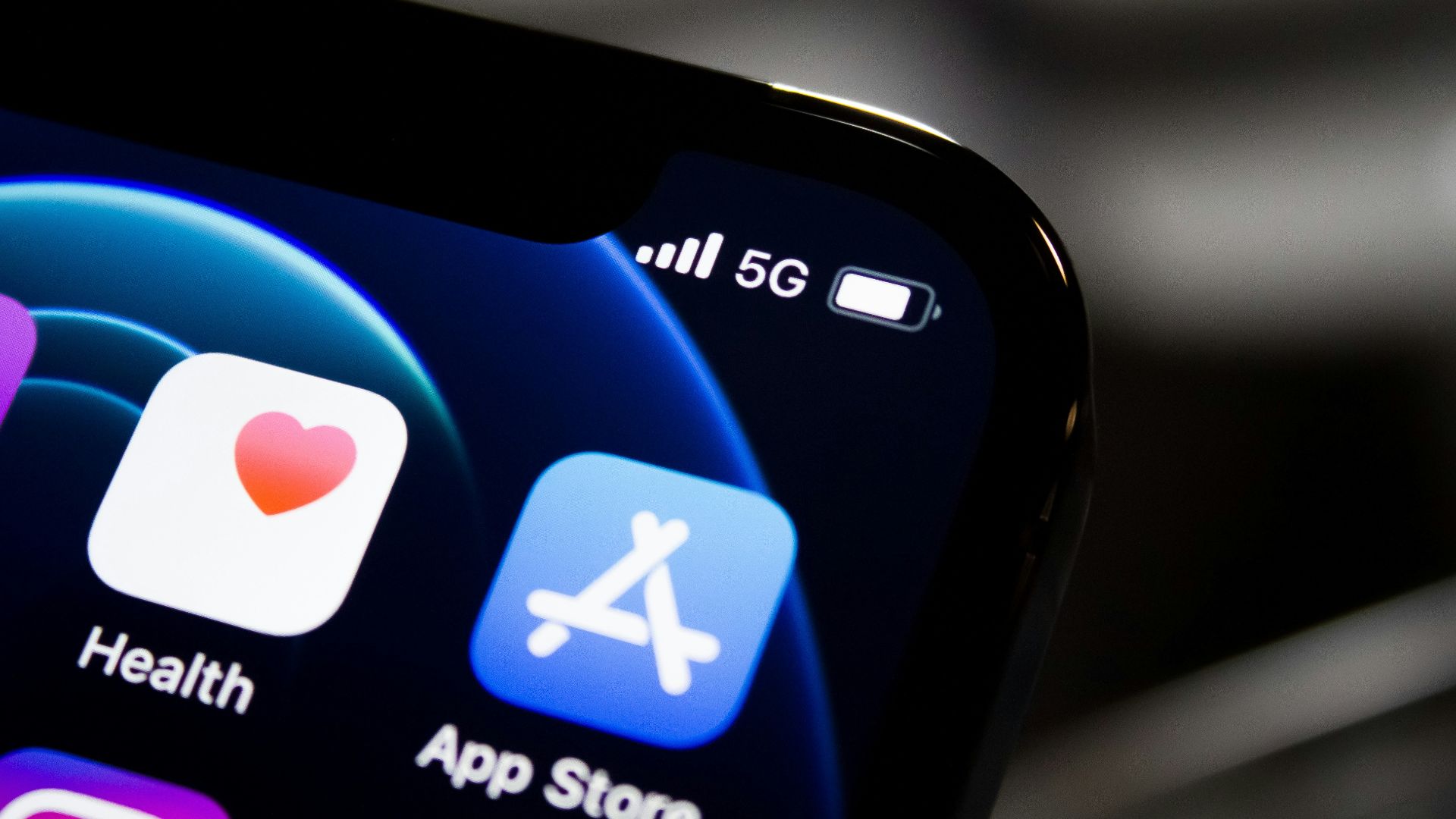 black iphone 4 displaying icons