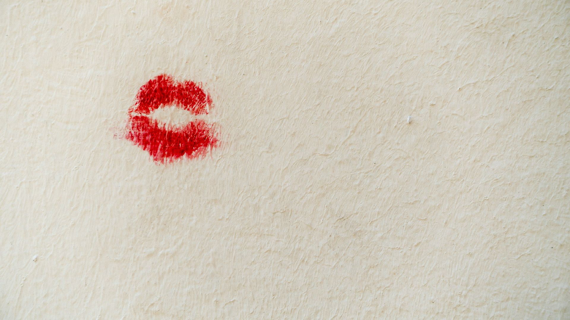 red stain on white wall