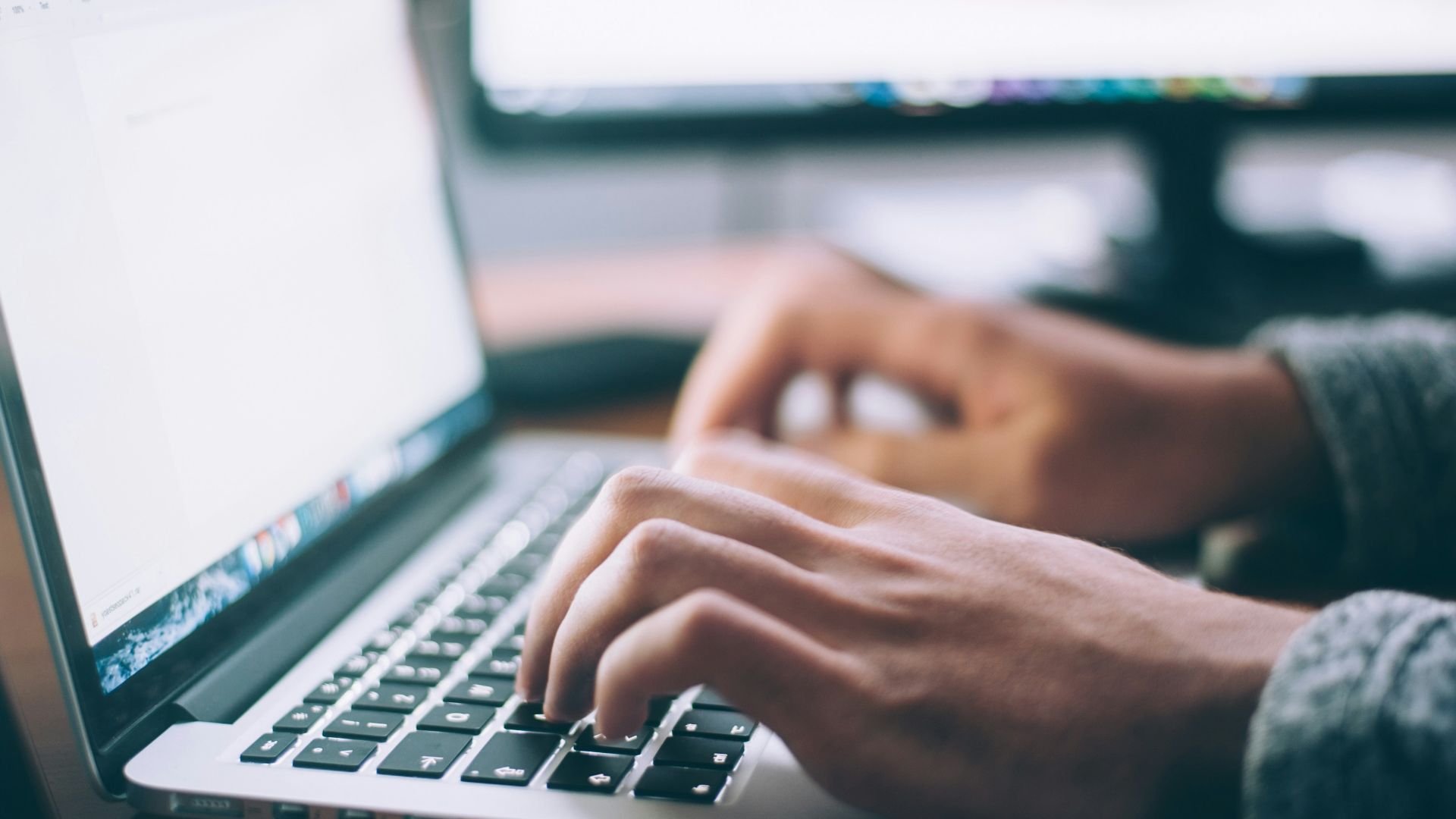 person using MacBook Pro