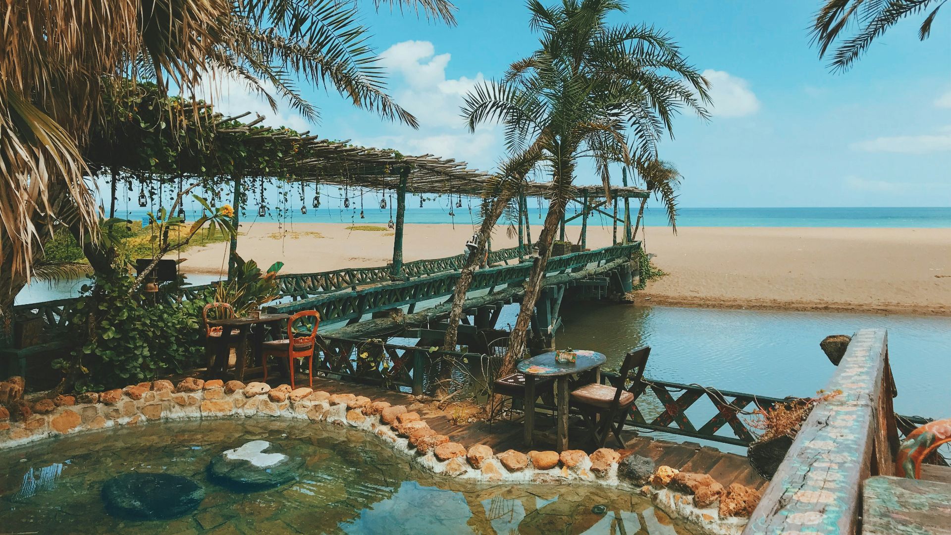 swimming pool beside dock and sea in nature photography