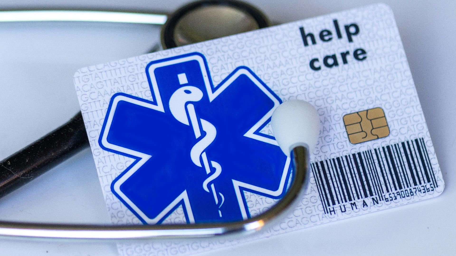 A medical card with a stethoscope on top of it