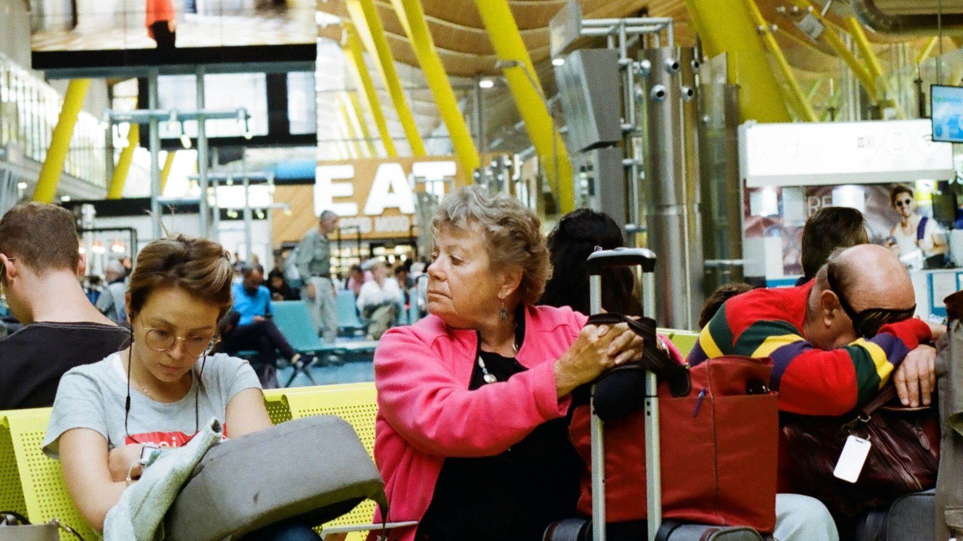people sitting on chair inside building