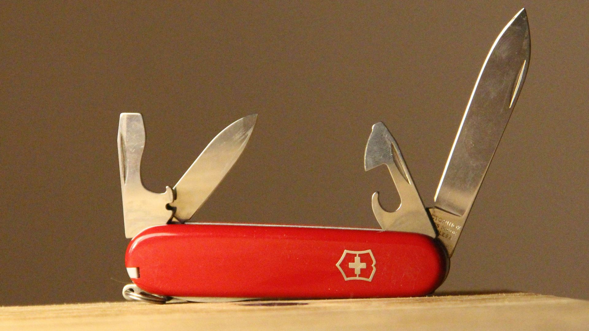 red and silver multi tool