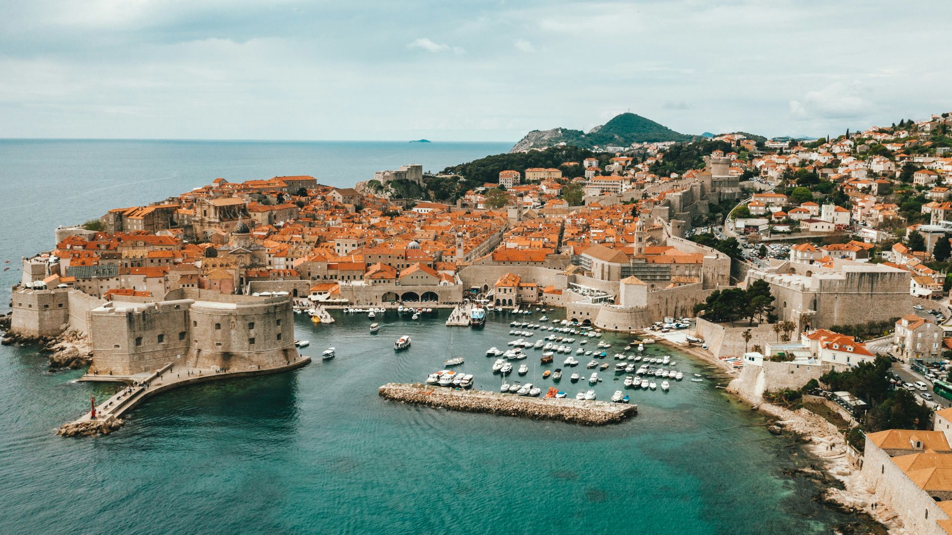 aerial view of buildings near ocean