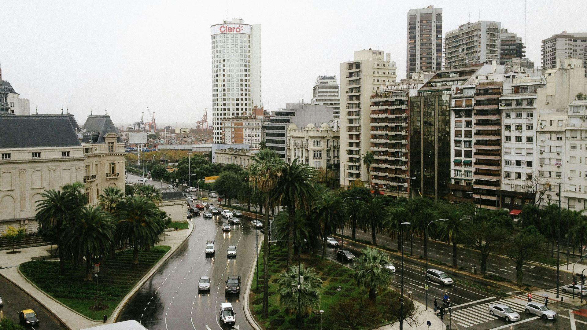 aerial photography of buildings and vehicles on road
