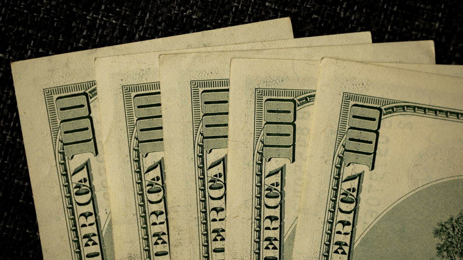 a close up of a bunch of money on a table