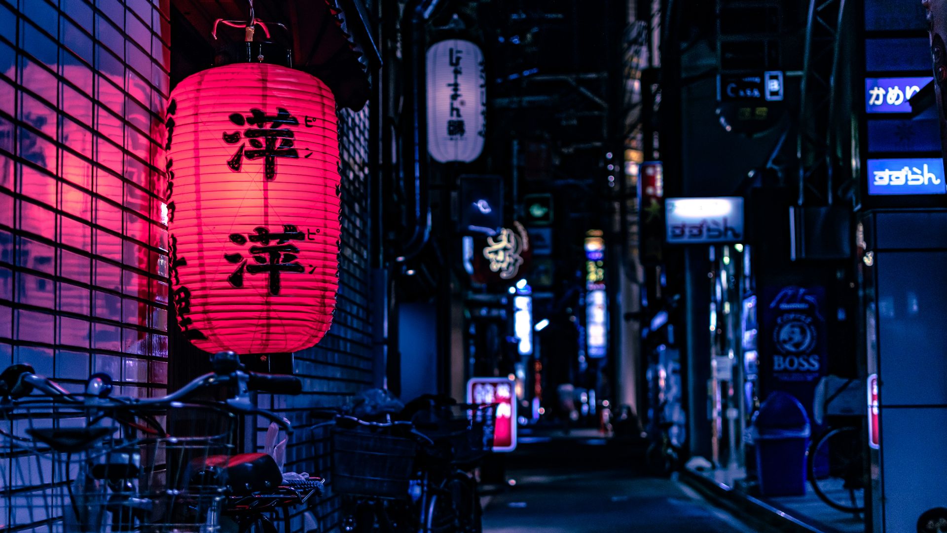 Japanese lantern over city bike at nighttime