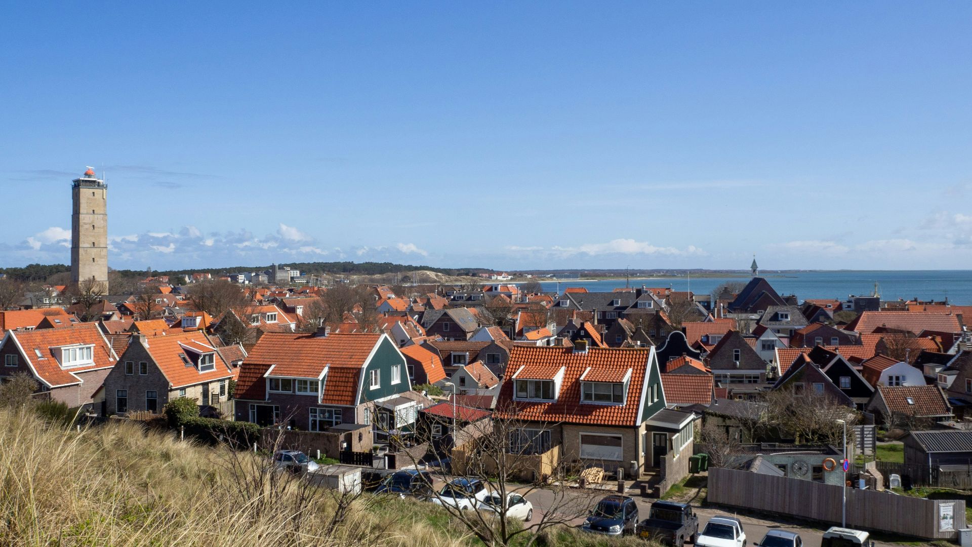 brown and white houses under blue sky during daytime